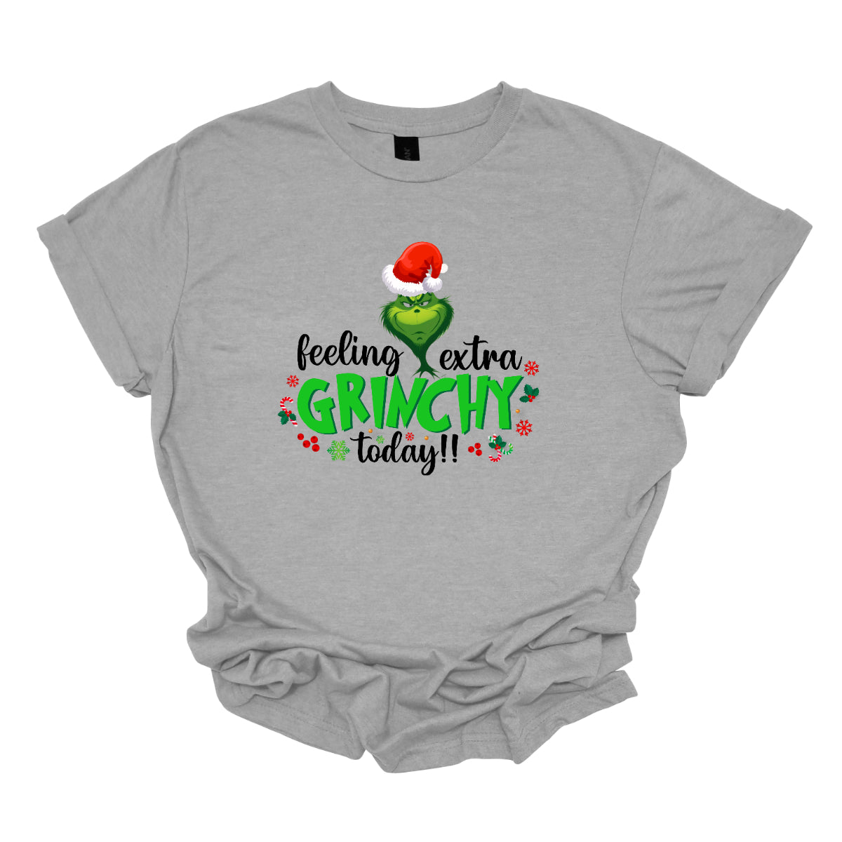 This T-shirt design exudes festive cheer and playful humor with its vibrant and eye-catching elements. The front of the shirt features the phrase, "Feeling extra grinchy today!!" prominently displayed in a fun and engaging. Shop Gorgeousware.com