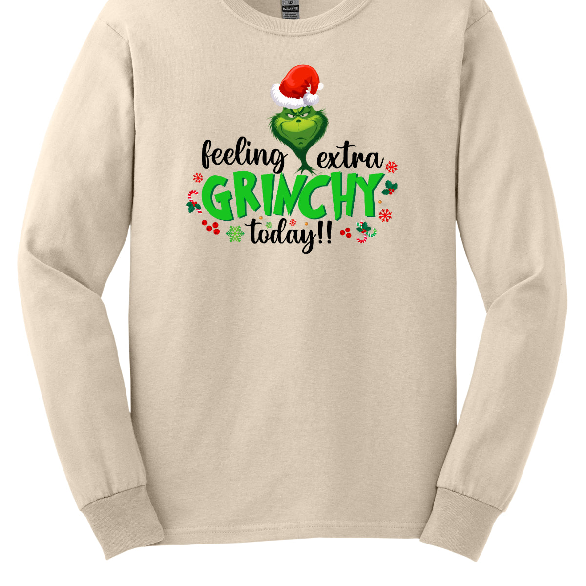 This T-shirt design exudes festive cheer and playful humor with its vibrant and eye-catching elements. The front of the shirt features the phrase, "Feeling extra grinchy today!!" prominently displayed in a fun and engaging. Shop Gorgeousware.com