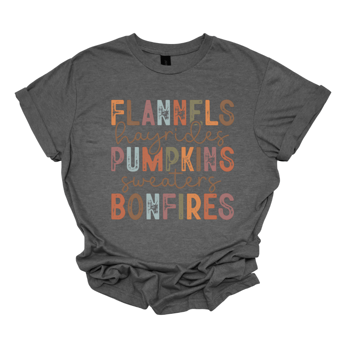 Get into the autumn spirit with our 'Fall Favorites' tee, featuring a dynamic design that celebrates all things cozy and festive! The shirt showcases the words 'Flannels,' 'Hayrides,' 'Pumpkins,' 'Sweaters,' and 'Bonfires,' each in a unique font style—from grunge print to elegant cursive. The vibrant, alternating colors add a playful touch to the design, capturing the essence of fall’s rich palette. Shop at Gorgeousware.com