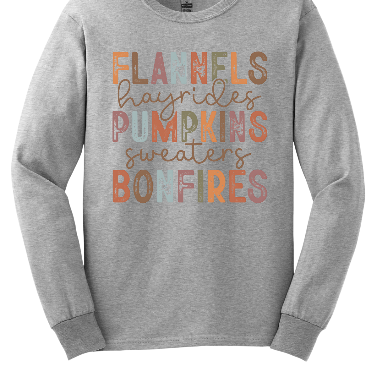 Get into the autumn spirit with our 'Fall Favorites' tee, featuring a dynamic design that celebrates all things cozy and festive! The shirt showcases the words 'Flannels,' 'Hayrides,' 'Pumpkins,' 'Sweaters,' and 'Bonfires,' each in a unique font style—from grunge print to elegant cursive. The vibrant, alternating colors add a playful touch to the design, capturing the essence of fall’s rich palette. Shop at Gorgeousware.com