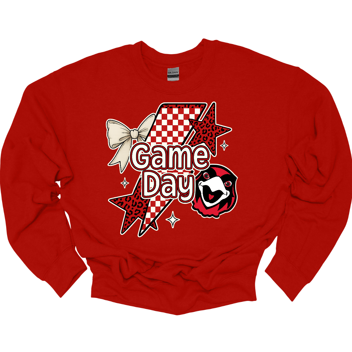 Bring energy to every game with the Game Day Rowdy youth collection! Available in short/ long sleeve, cozy crewneck, and warm hoodie styles. The bold design features a dynamic checkerboard and animal print shooting star, symbolizing the unstoppable energy of the Redhawks. A playful croquette bow adds a fun twist, while the fearless Redhawk takes stage, embodying team strength and spirit. The look is completed with powerful “Game Day” lettering in crisp white. 
Shop at Gorgeousware.com today!
