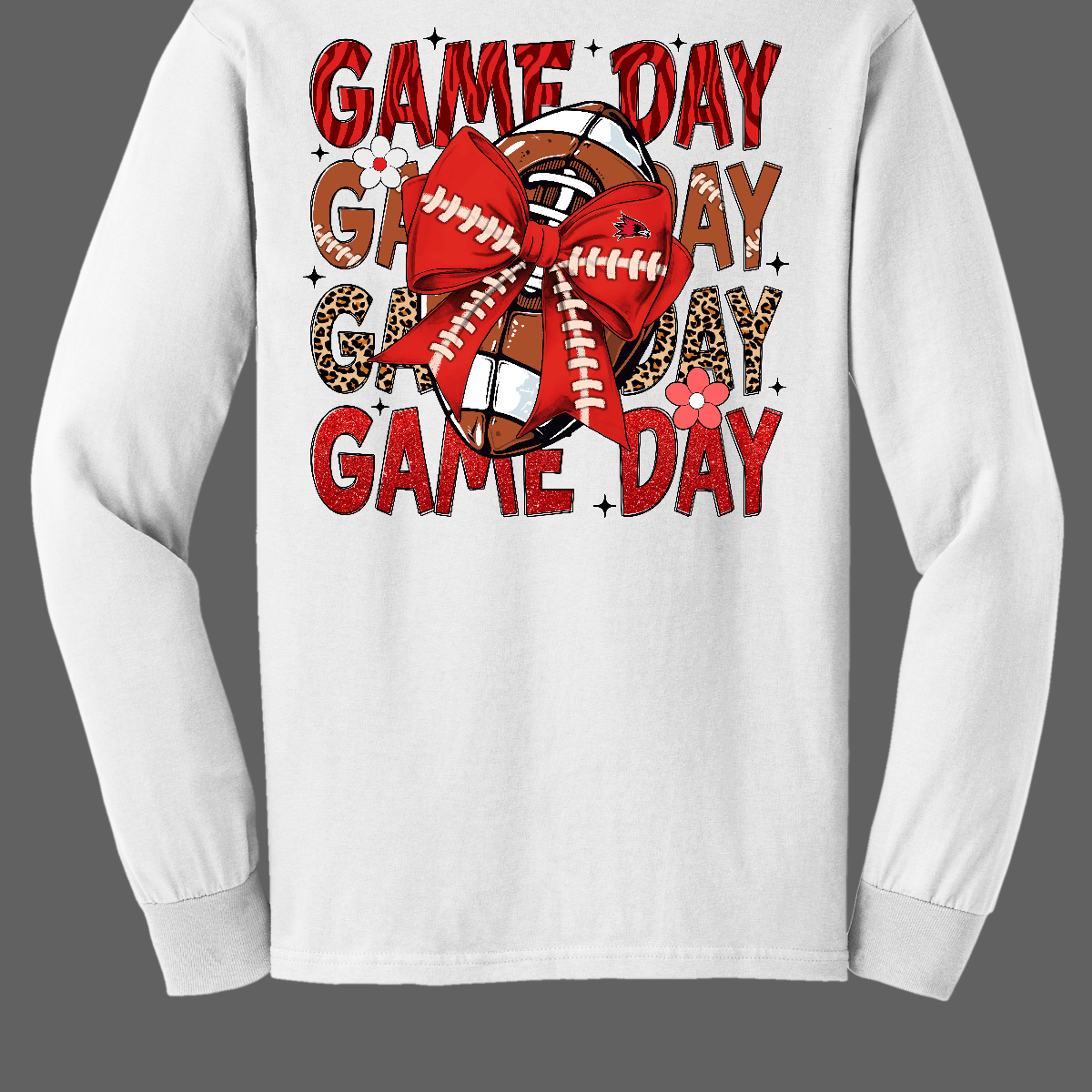 This bold SEMO long-sleeved tee packs serious team spirit into every detail. The front has a ferocious Redhawk graphic paired with SEMO in bold white lettering over the left chest. The back has “Game Day” repeated in eye catching animal print and football-lace lettering. A football wrapped in a red bow steals the spotlight, complete with football-lace details and a small Redhawk perched on the bow. Shop at Gorgeousware.com today!