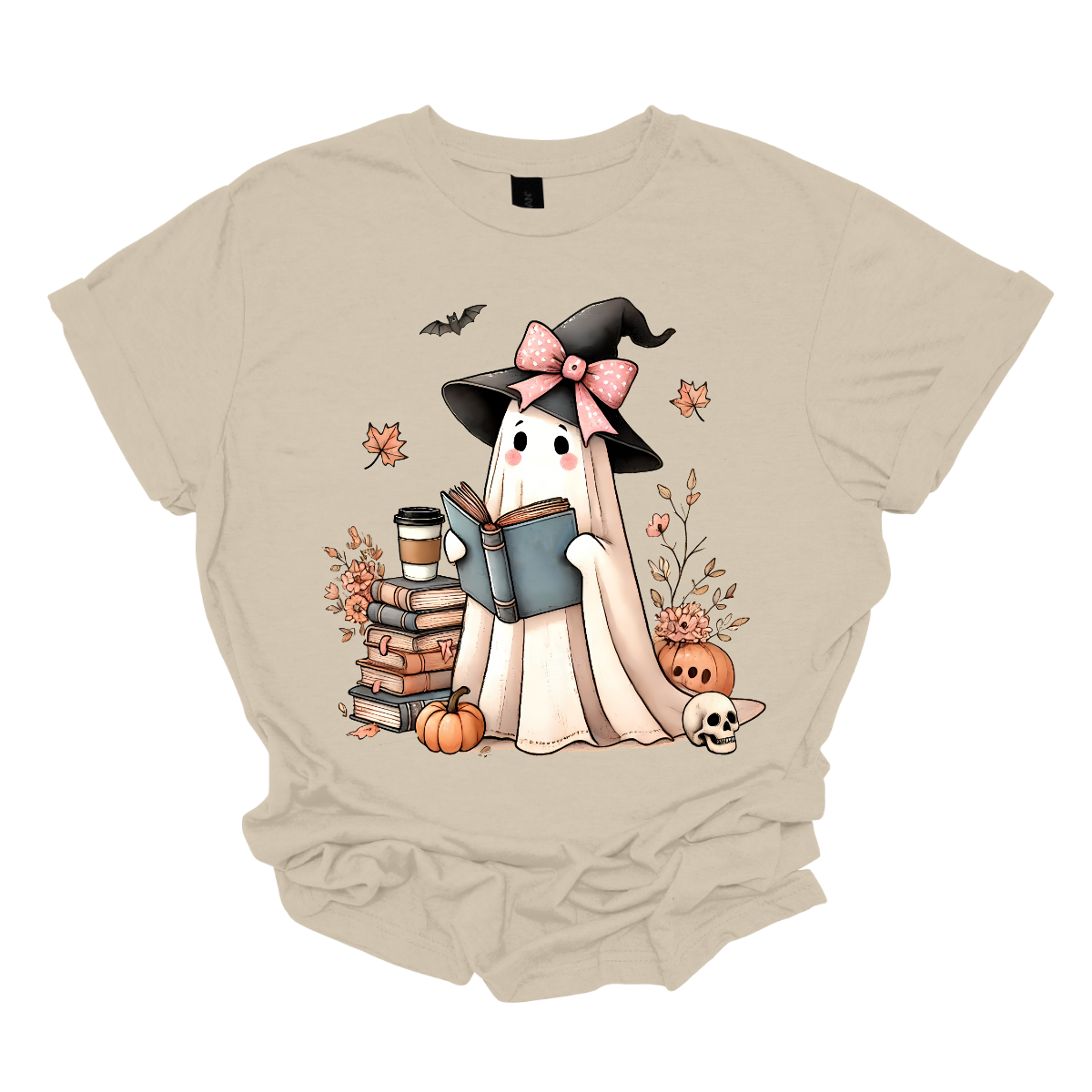 This T-shirt features an adorable ghost wearing a witch's hat adorned with a pink bow. The ghost has a warm, friendly expression as she enjoys her coffee, with a stack of books by her side.&nbsp; Around her, small pumpkins are scattered on the ground, adding a cozy, autumnal vibe. The design perfectly captures the charm of the Halloween season with a cute and whimsical twist. Shop at Gorgeousware.com