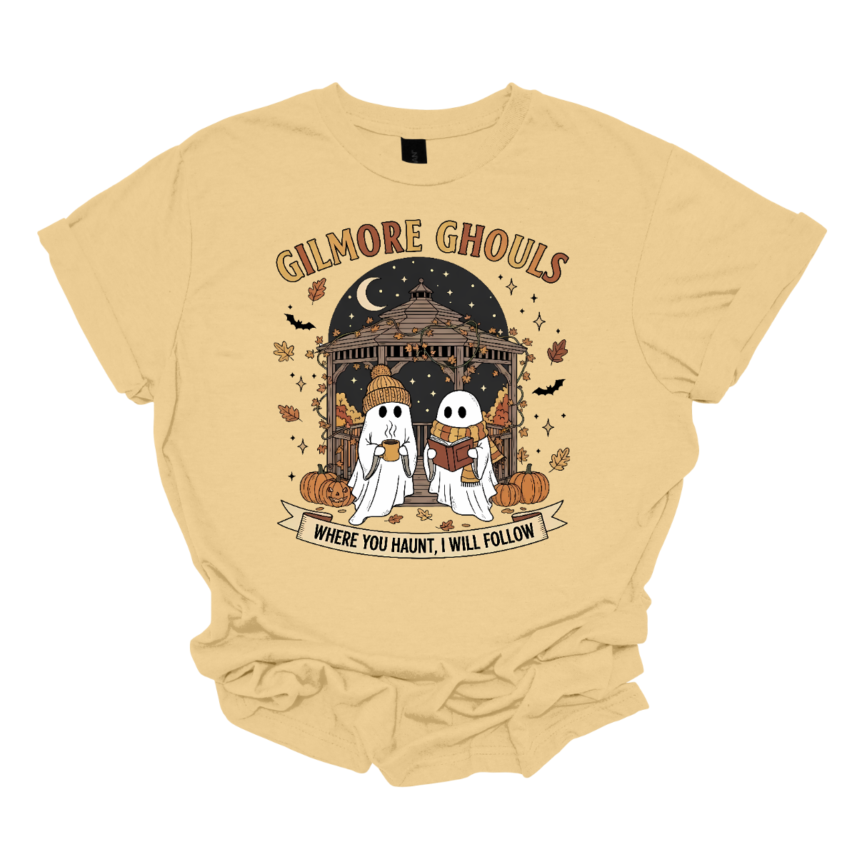 Calling all Gilmore Girls fans with a love for spooky season! 👻🍂 This Gilmore Ghouls graphic tee is the perfect mix of cozy and creepy-cute. The design features two friendly ghosts standing under a gazebo — one sipping a steaming mug, the other lost in a good book. The backdrop is filled with glowing jack-o’-lanterns, pumpkins, fluttering bats, and falling autumn leaves for the ultimate fall aesthetic. Shop at Gorgeousware.com