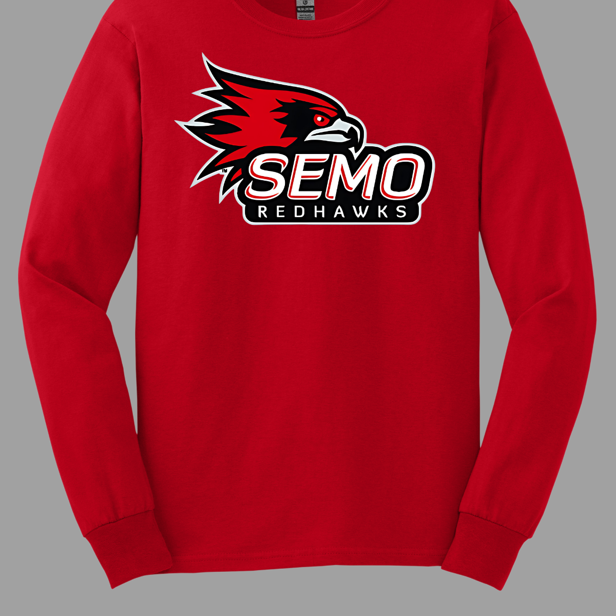 This vibrant t-shirt features the iconic SEMO Redhawk logo prominently displayed at the top, showcasing the fierce spirit of the team. Below the hawk, bold bubble letters spell out "SEMO," creating a playful and eye-catching design. Just underneath, in smaller, stylish print, the word "Redhawks" completes the look, making it a perfect blend of fun and team pride.  Shop at Gorgeousware.com