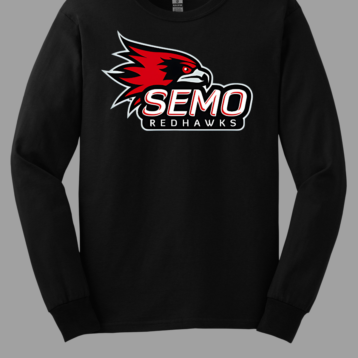 This vibrant t-shirt features the iconic SEMO Redhawk logo prominently displayed at the top, showcasing the fierce spirit of the team. Below the hawk, bold bubble letters spell out "SEMO," creating a playful and eye-catching design. Just underneath, in smaller, stylish print, the word "Redhawks" completes the look, making it a perfect blend of fun and team pride.  Shop at Gorgeousware.com