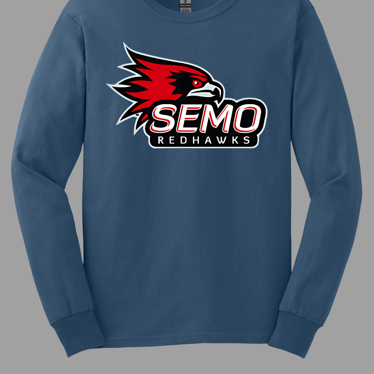 This vibrant t-shirt features the iconic SEMO Redhawk logo prominently displayed at the top, showcasing the fierce spirit of the team. Below the hawk, bold bubble letters spell out "SEMO," creating a playful and eye-catching design. Just underneath, in smaller, stylish print, the word "Redhawks" completes the look, making it a perfect blend of fun and team pride.  Shop at Gorgeousware.com