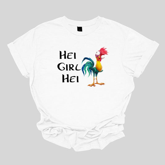 This t-shirt features a playful and vibrant design with the phrase "Hei Girl Hei" emblazoned in a lively, cartoonish black font that adds a fun and energetic touch. The words are arranged in a way that captures attention and conveys a cheerful message. Next to the text is the charming cartoon character Hei Hei from Disney's Moana. Hei Hei is depicted with his usual goofy expression and colorful plumage, bringing a whimsical and endearing element to the design. Shop Gorgeousware.com