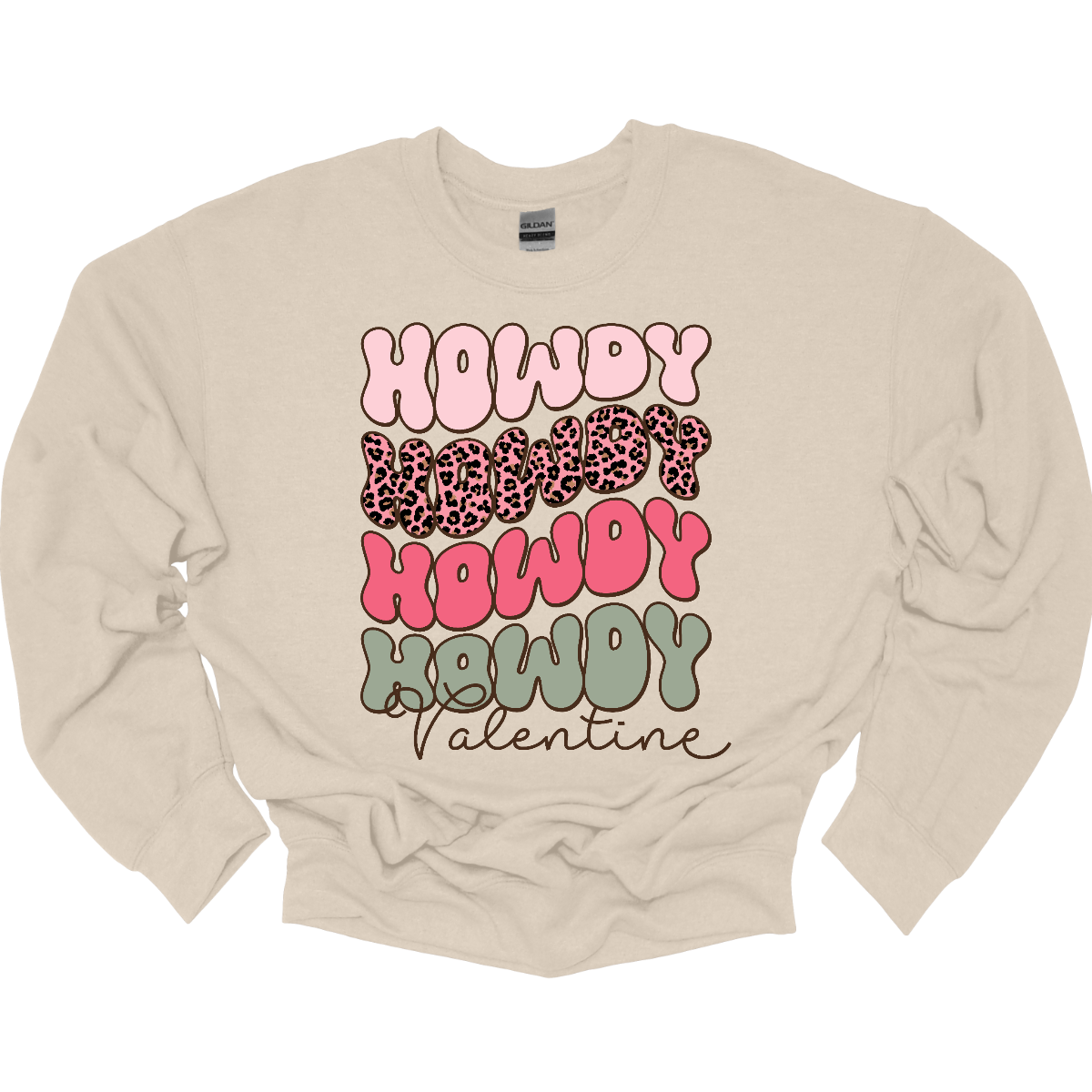 Introducing our "Howdy Valentine" T-shirt – a retro-inspired masterpiece that adds a touch of vintage charm to your Valentine's Day celebration. This shirt features a stylish retro font in soft pinks and sage colors, creating a delightful and nostalgic vibe perfect for expressing love with a Western twist.  The phrase "Howdy Valentine" is elegantly displayed in a retro font, evoking the classic aesthetics of bygone eras. Shop at Gorgeousware.com