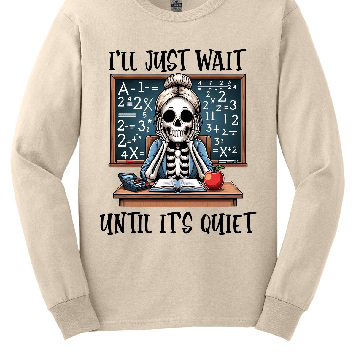 This T-shirt features a skeleton sitting at a cluttered desk, dressed in a cozy cardigan with a messy bun on top of its skull. The skeleton is leaning forward, resting its head on its bony hands as if exhausted or overwhelmed.  The shirt says, "I'll just wait until its quiet".  Shop at Gorgeousware.com 