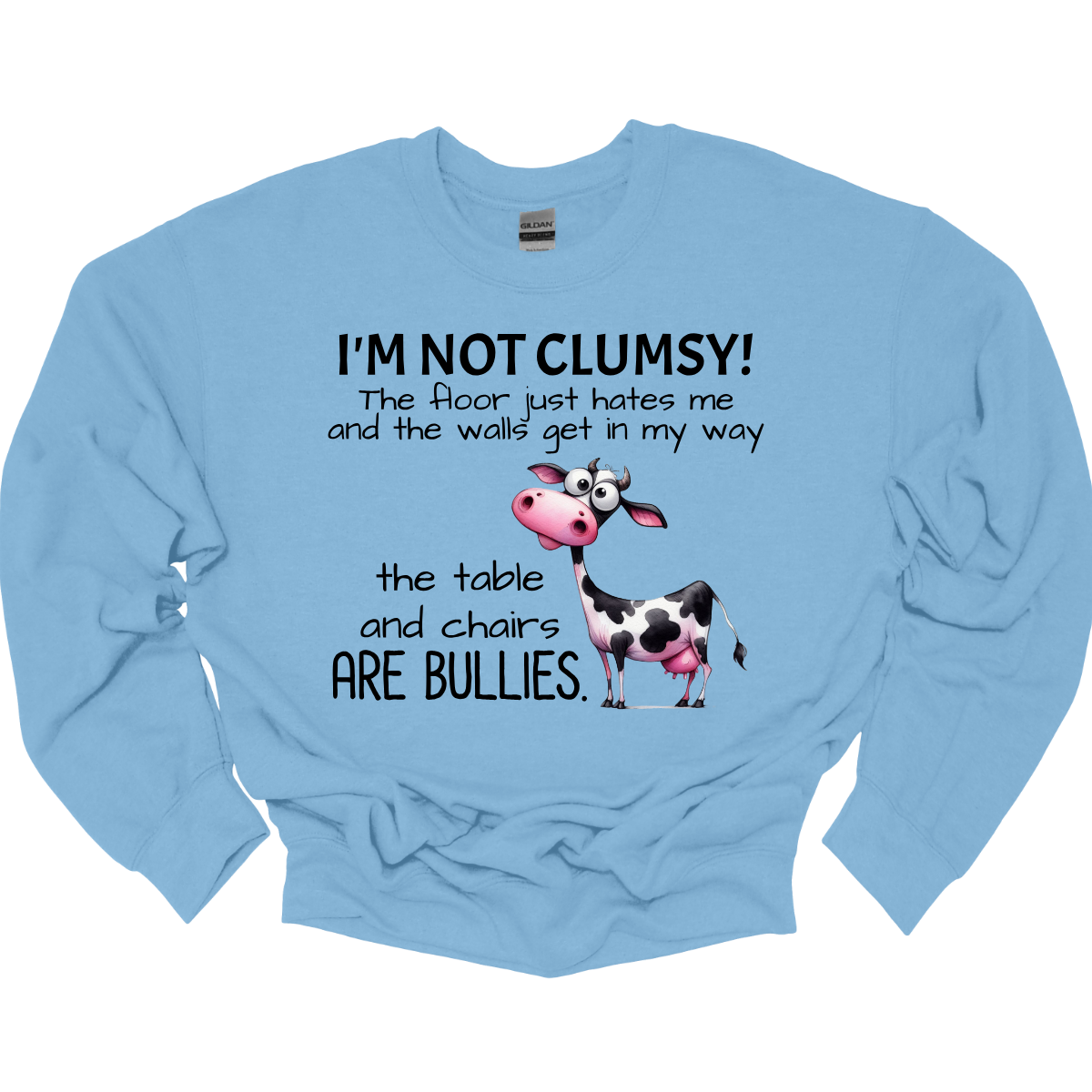 Ever feel like the universe is out to get you? With our “I’m not clumsy! The floor just hates me, and the walls get in my way, the tables and chairs are bullies” t-shirt, you can wear your battle scars with pride! Featuring a cheeky bull design, this shirt is perfect for anyone who’s had their fair share of run-ins with furniture and flooring. Shop at Gorgeousware.com