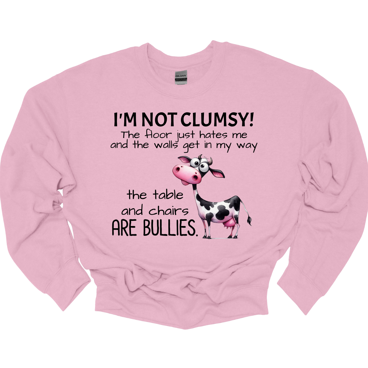 Ever feel like the universe is out to get you? With our “I’m not clumsy! The floor just hates me, and the walls get in my way, the tables and chairs are bullies” t-shirt, you can wear your battle scars with pride! Featuring a cheeky bull design, this shirt is perfect for anyone who’s had their fair share of run-ins with furniture and flooring. Shop at Gorgeousware.com