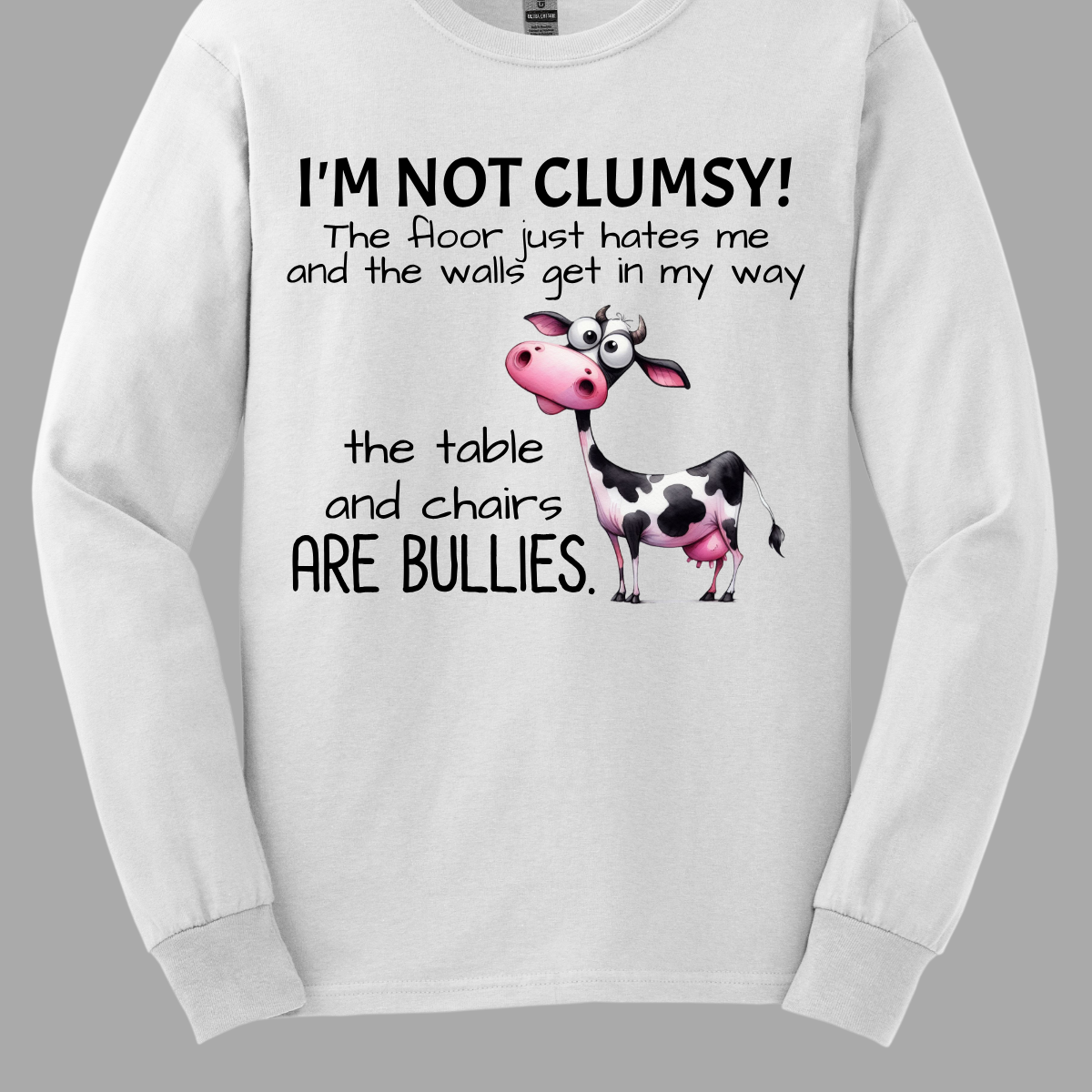 Ever feel like the universe is out to get you? With our “I’m not clumsy! The floor just hates me, and the walls get in my way, the tables and chairs are bullies” t-shirt, you can wear your battle scars with pride! Featuring a cheeky bull design, this shirt is perfect for anyone who’s had their fair share of run-ins with furniture and flooring. Shop at Gorgeousware.com