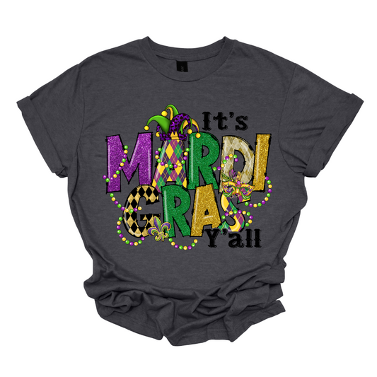 Get ready to party in style with our 'It's Mardi Gras Time Y'all' T-shirt, complete with festive Mardi Gras beads. This tee is the ultimate celebration of the vibrant and lively spirit of Mardi Gras. The bold statement captures the excitement of the festivities, while the colorful beads add a touch of traditional flair. Shop at Gorgeousware.com