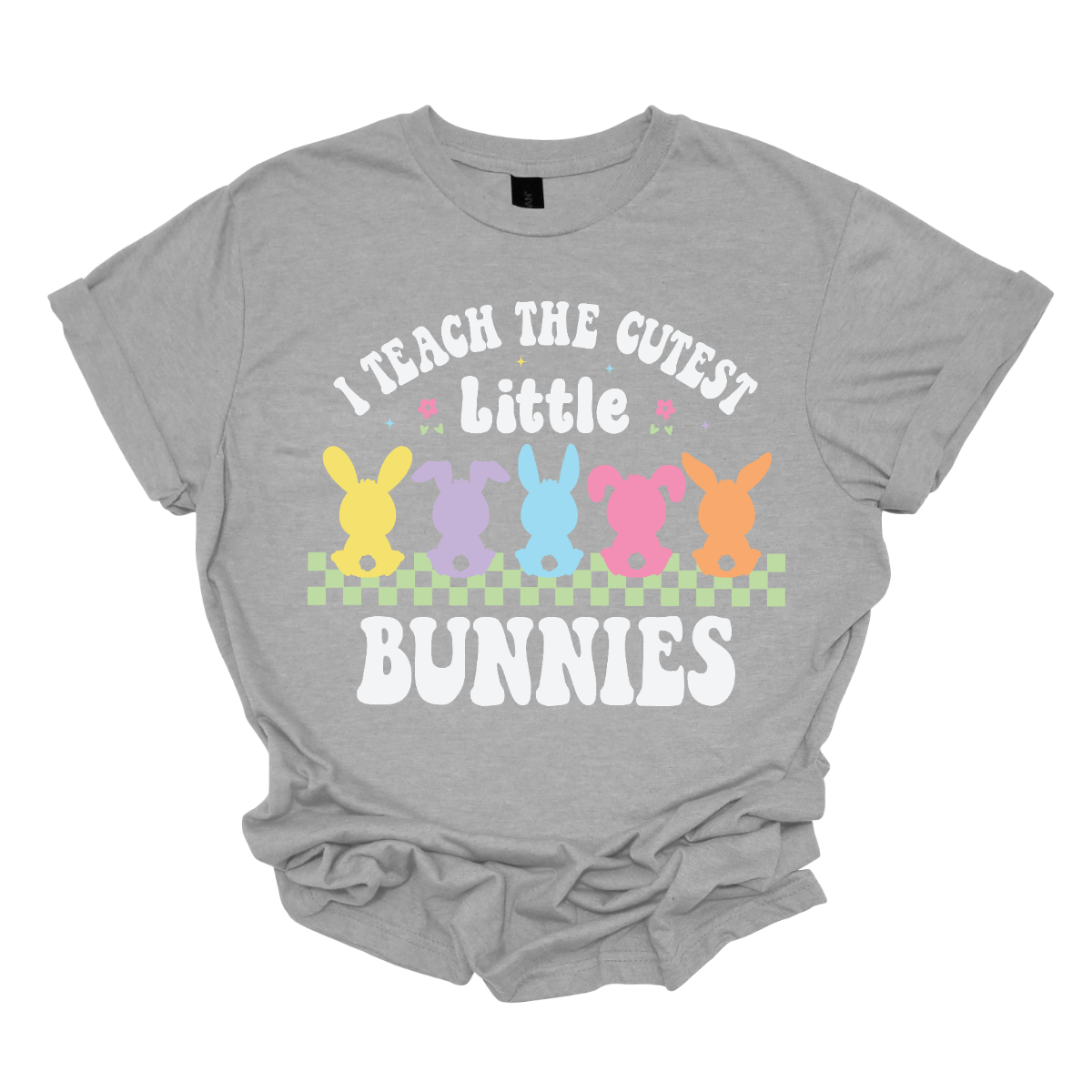 Show off your love for teaching with our 'I teach the cutest little bunnies' T-shirt! Adorned with five adorable pastel bunnies sitting in a row, this shirt is a sweet celebration of the precious students who fill your classroom. Shop now at Gorgeousware.com