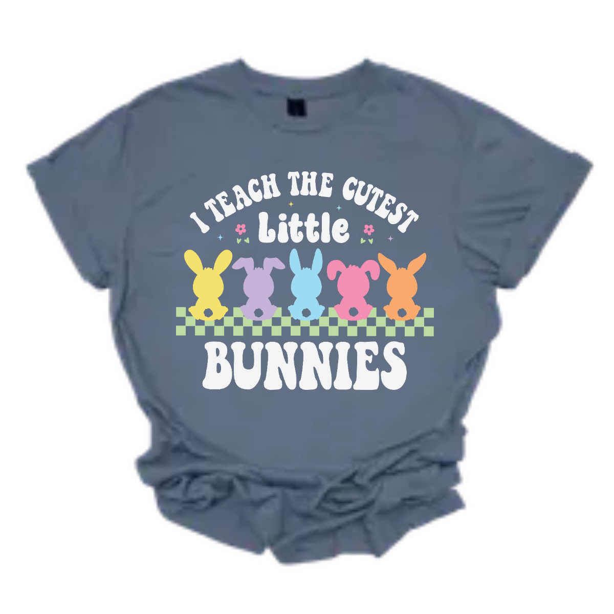 Show off your love for teaching with our 'I teach the cutest little bunnies' T-shirt! Adorned with five adorable pastel bunnies sitting in a row, this shirt is a sweet celebration of the precious students who fill your classroom. Shop now at Gorgeousware.com