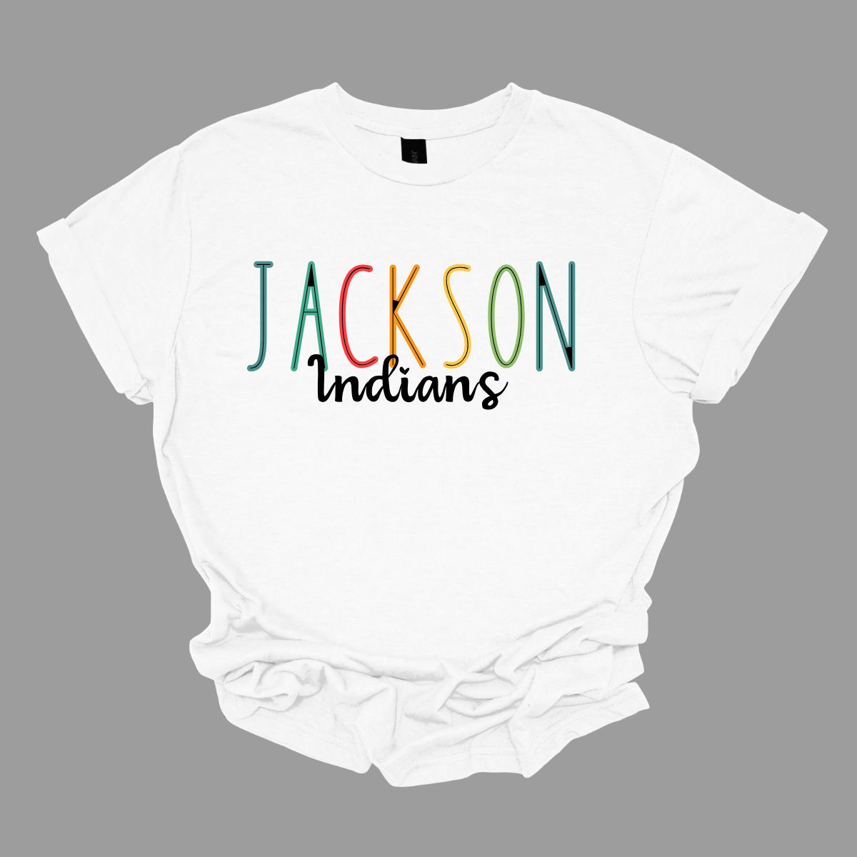 Show your Jackson pride with our vibrant Jackson Indians Spiritwear T-shirt! This eye-catching design features "Jackson" prominently highlighted in a spectrum of bold, dynamic colors, showcasing your school spirit in every shade. The word "Indians" is elegantly scripted in black cursive, adding a touch of classic sophistication to this spirited tee.  Shop at Gorgeousware.com