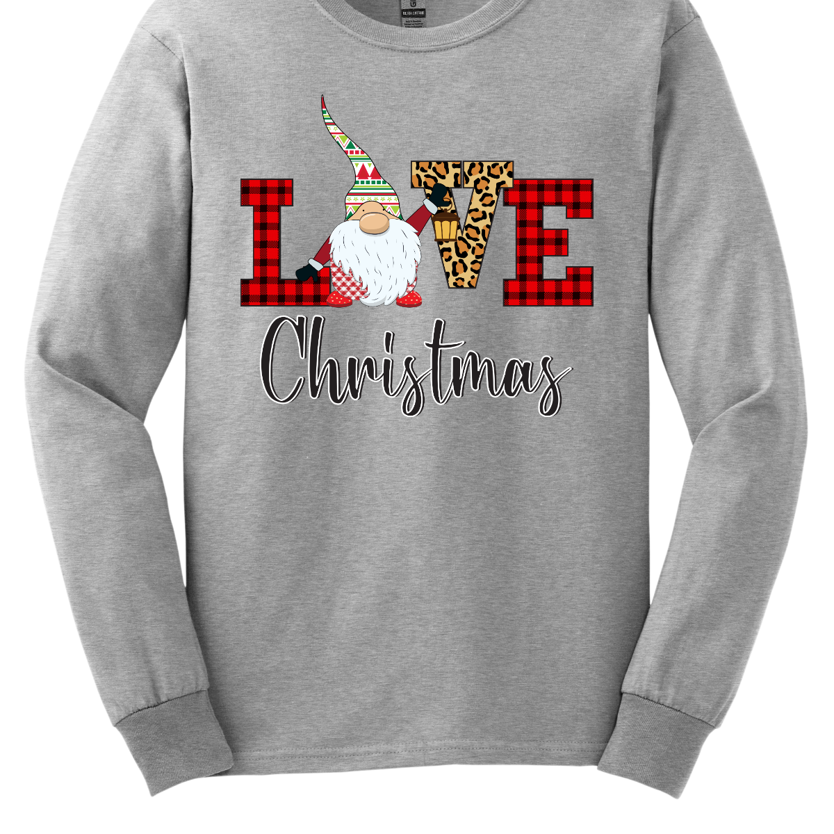 This charming t-shirt showcases the word "LOVE" in a festive and fun design. The letters "L" and "E" are styled in a classic red buffalo plaid, adding a cozy, rustic touch. The "V" pops with a bold cheetah print, bringing an unexpected and trendy flair to the design. The "O" is replaced by an adorable gnome, whose whimsical hat features a cheerful ugly sweater Christmas pattern in vibrant red, green, and white. Shop at Gorgeousware.com