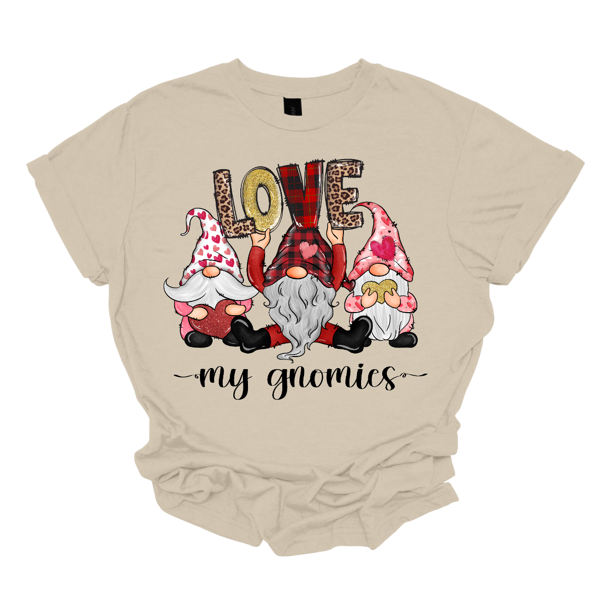 Introducing our "Love My Gnomies" T-shirt – a heartwarming and whimsical garment that celebrates the joy of friendship with three adorable gnomes holding up the word "love." This shirt is a delightful expression of love and camaraderie perfect for Valentine's Day. The design features three adorable gnomes, holding up the word "love," creating a cute and charming scene. Shop at Gorgeousware.com