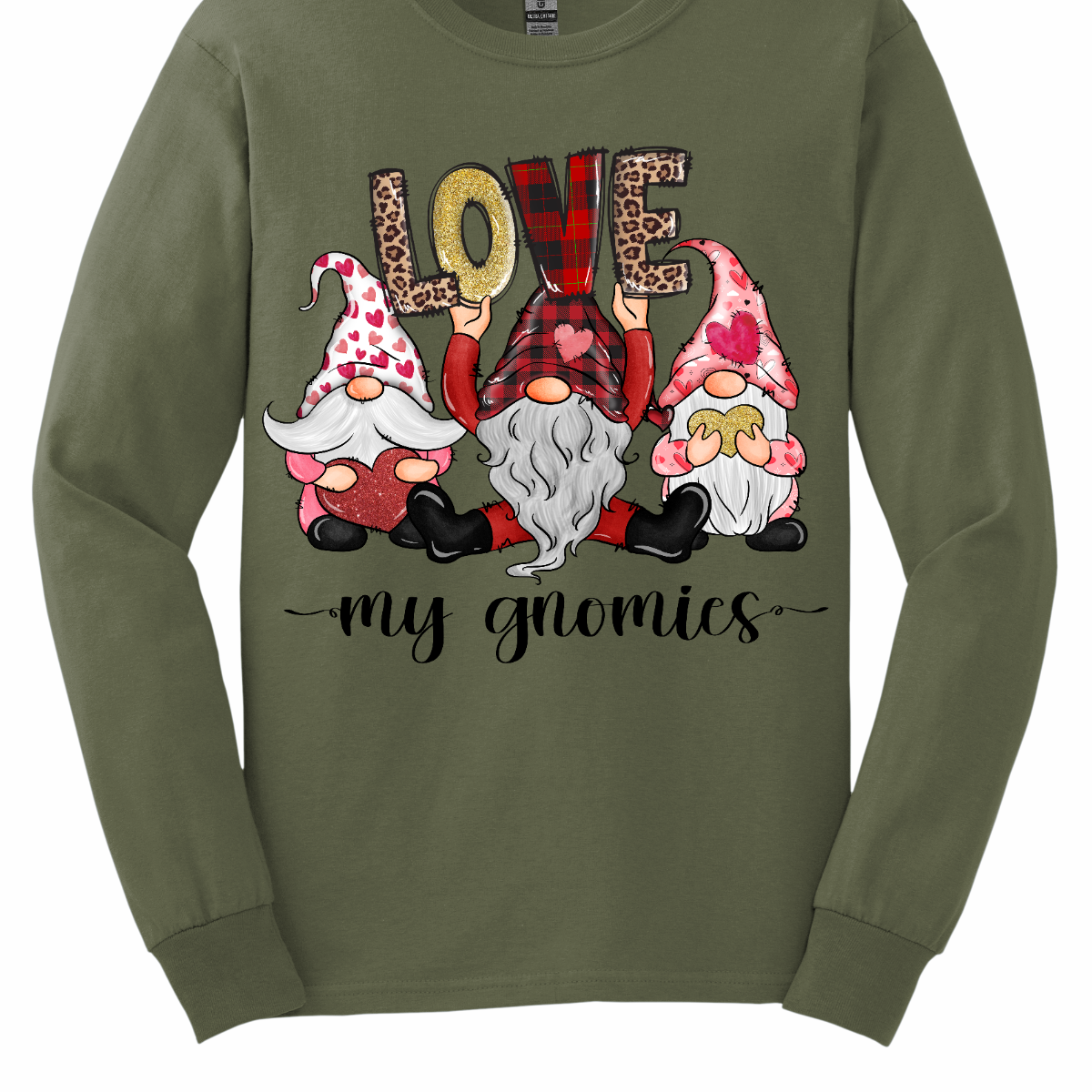 Introducing our "Love My Gnomies" T-shirt – a heartwarming and whimsical garment that celebrates the joy of friendship with three adorable gnomes holding up the word "love." This shirt is a delightful expression of love and camaraderie perfect for Valentine's Day. The design features three adorable gnomes, holding up the word "love," creating a cute and charming scene. Shop at Gorgeousware.com