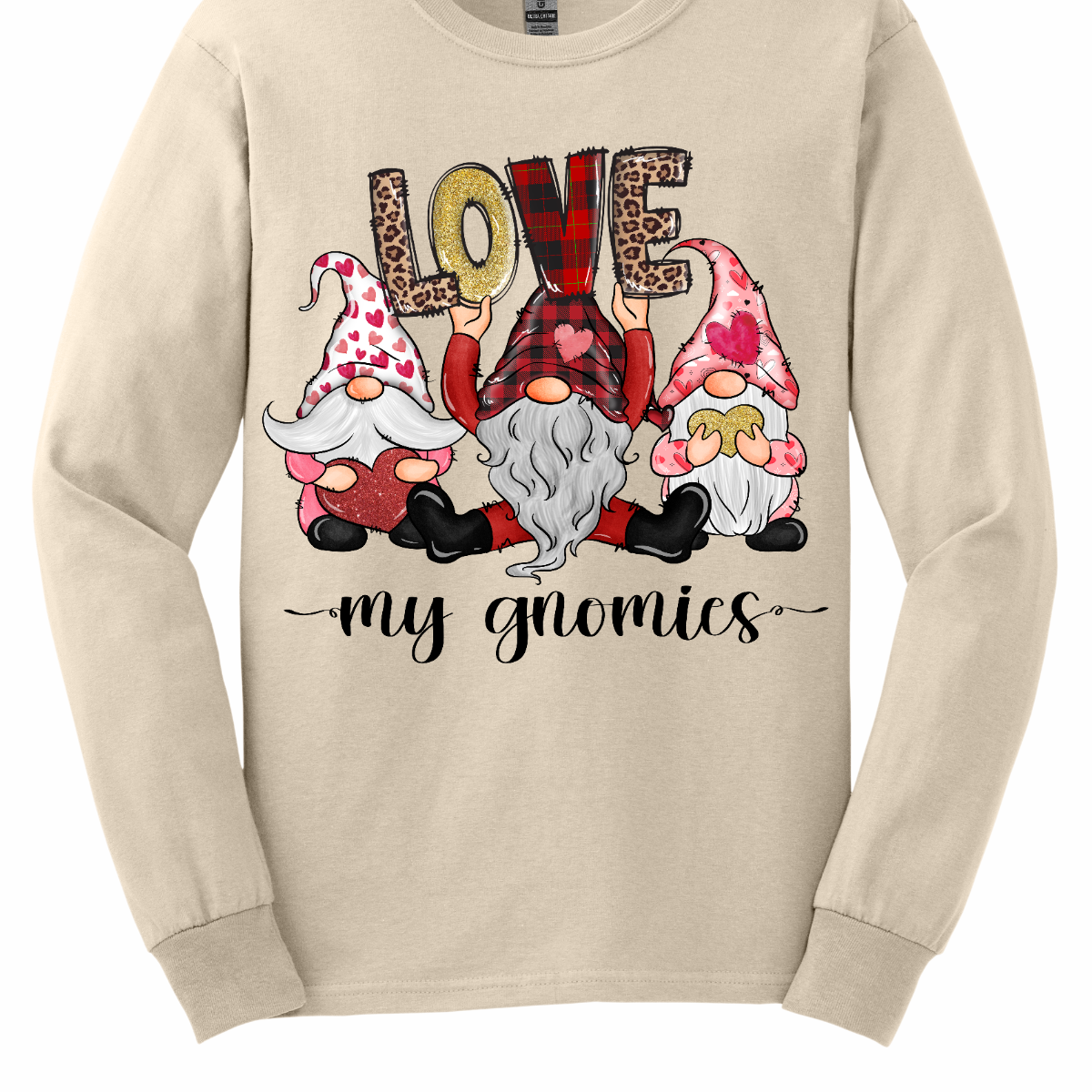 Introducing our "Love My Gnomies" T-shirt – a heartwarming and whimsical garment that celebrates the joy of friendship with three adorable gnomes holding up the word "love." This shirt is a delightful expression of love and camaraderie perfect for Valentine's Day. The design features three adorable gnomes, holding up the word "love," creating a cute and charming scene. Shop at Gorgeousware.com