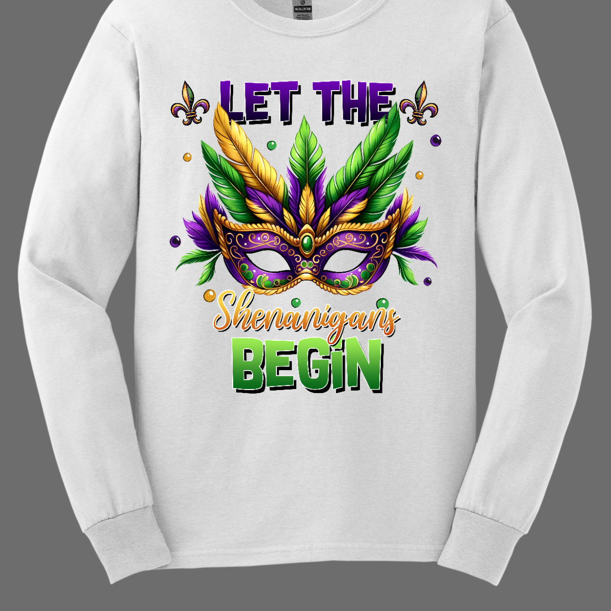 Get ready to unleash the revelry in style with our 'Let the Shenanigans Begin' Mardi Gras shirt! Featuring a vibrant Mardi Gras mask design, this shirt is your ticket to embracing the festive spirit and kicking off the celebration in true New Orleans fashion. Shop at Gorgeousware.com