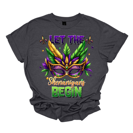 Get ready to unleash the revelry in style with our 'Let the Shenanigans Begin' Mardi Gras shirt! Featuring a vibrant Mardi Gras mask design, this shirt is your ticket to embracing the festive spirit and kicking off the celebration in true New Orleans fashion. Shop at Gorgeousware.com