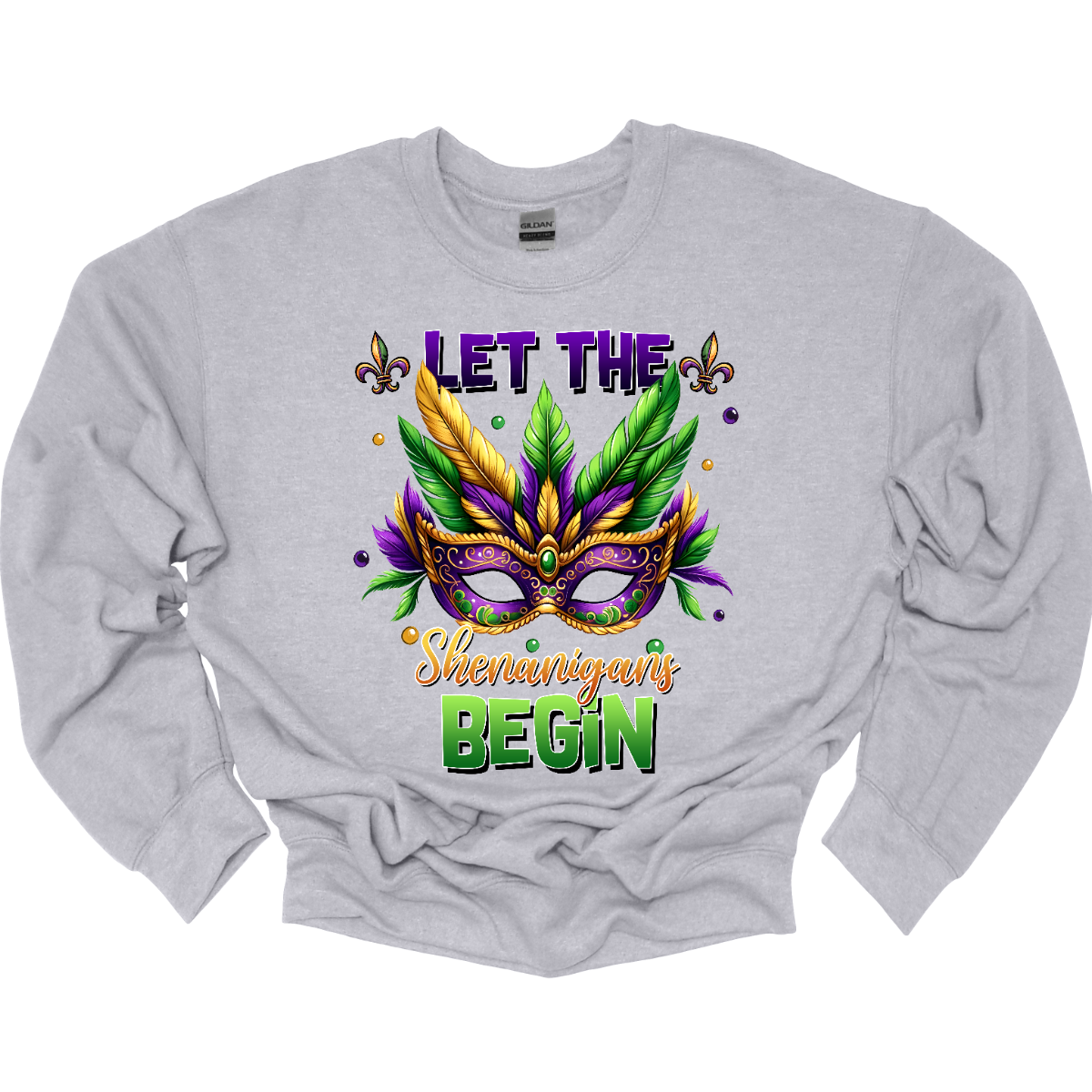 Get ready to unleash the revelry in style with our 'Let the Shenanigans Begin' Mardi Gras shirt! Featuring a vibrant Mardi Gras mask design, this shirt is your ticket to embracing the festive spirit and kicking off the celebration in true New Orleans fashion. Shop at Gorgeousware.com