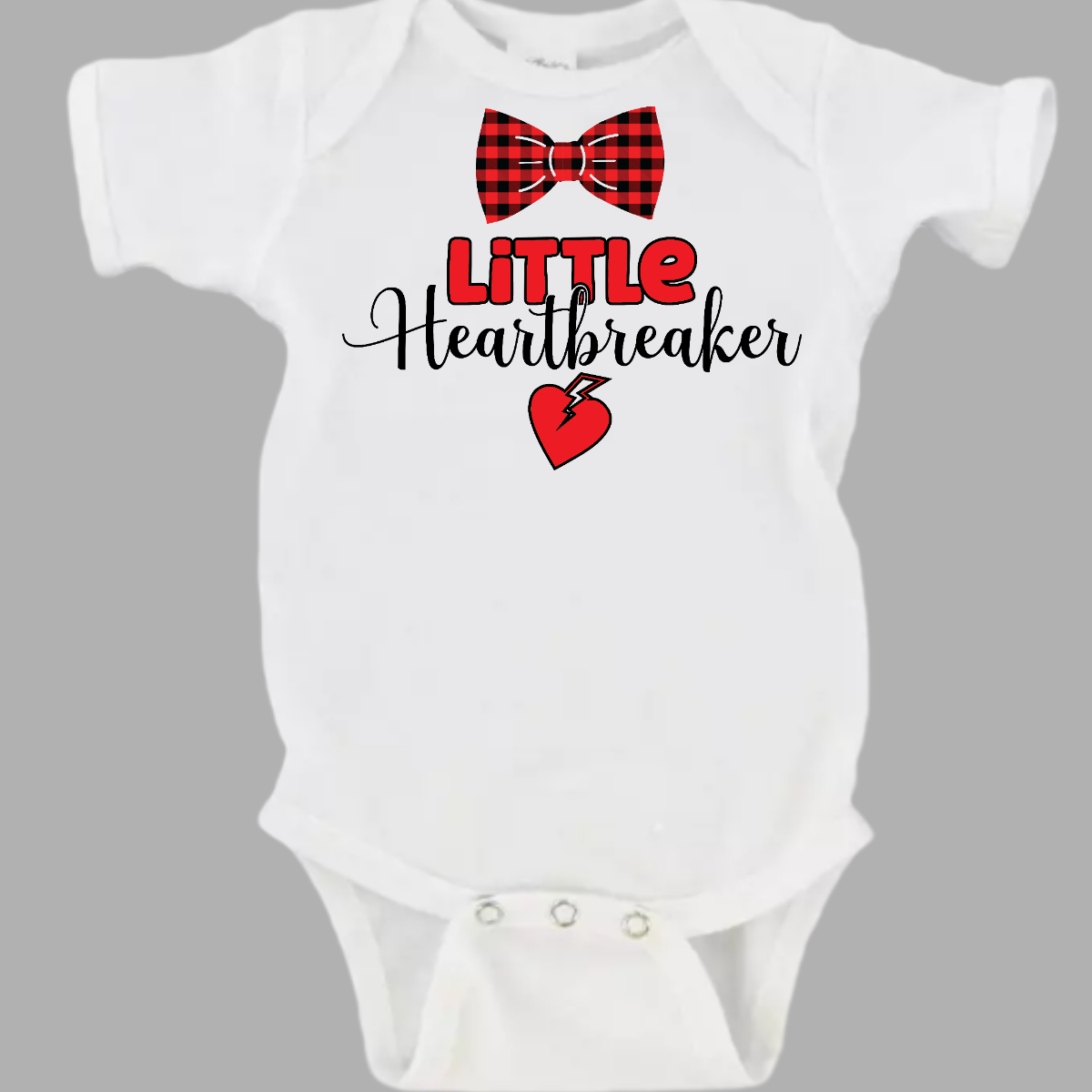 Dress your little charmer in our 'Little Heartbreaker' T-shirt with Bowtie, a perfect blend of adorability and style. This cute and comfy tee features a charming bowtie accent, adding a touch of sophistication to your little one's ensemble. The 'Little Heartbreaker' design, coupled with the playful bowtie, creates a heartwarming and stylish statement.