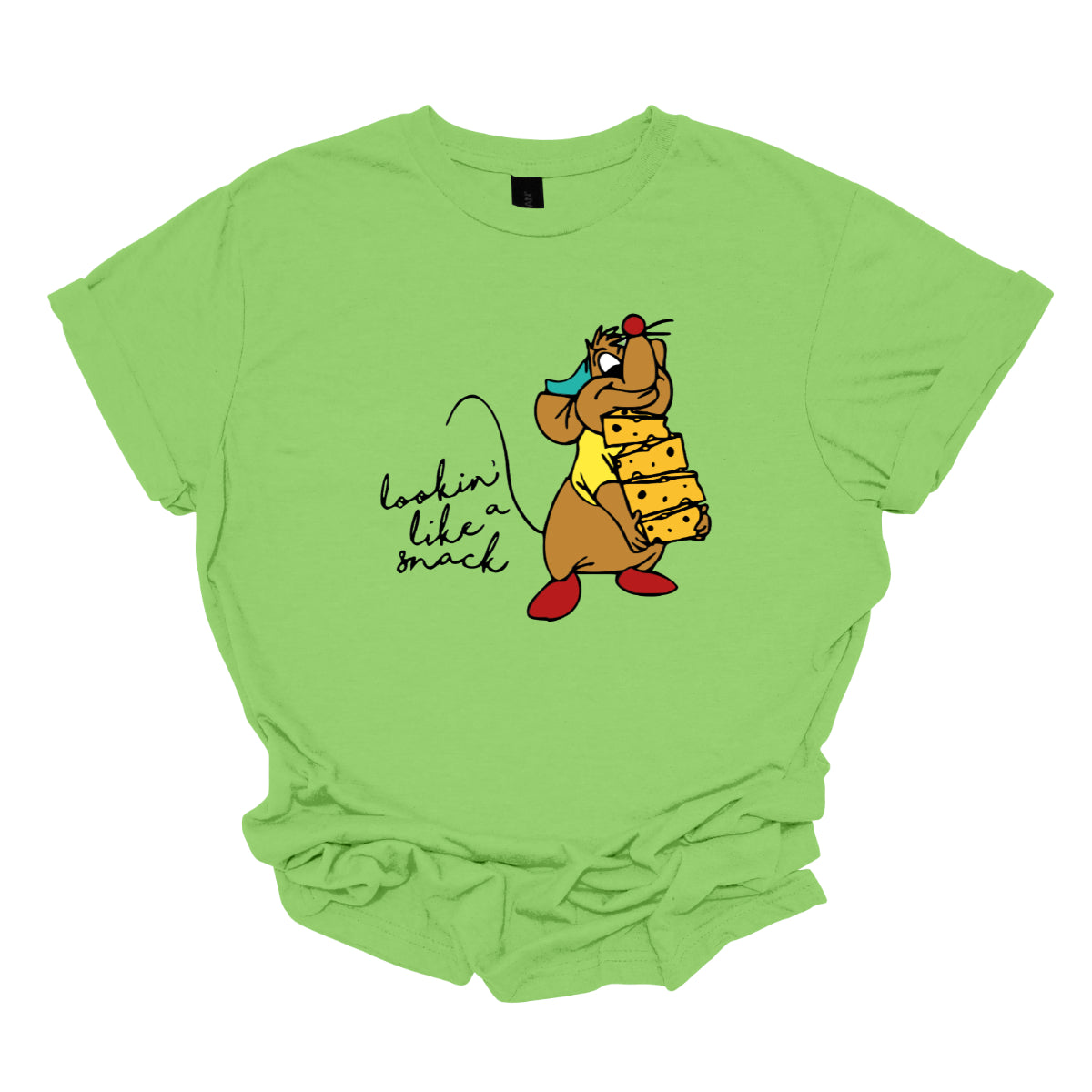 This t-shirt showcases a fun and cheeky design with the playful phrase "Lookin' Like a Snack" written in a delicate black cursive font that adds a touch of elegance. The text is both stylish and sassy, making a light-hearted statement.&nbsp;Adjacent to the text, there's an adorable illustration of the cartoon character Gus Gus from Cinderella. Gus Gus is depicted carrying a blocks of cheese stacked high, balancing it on his chin with a charmingly clumsy look. Shop Gorgeousware.com