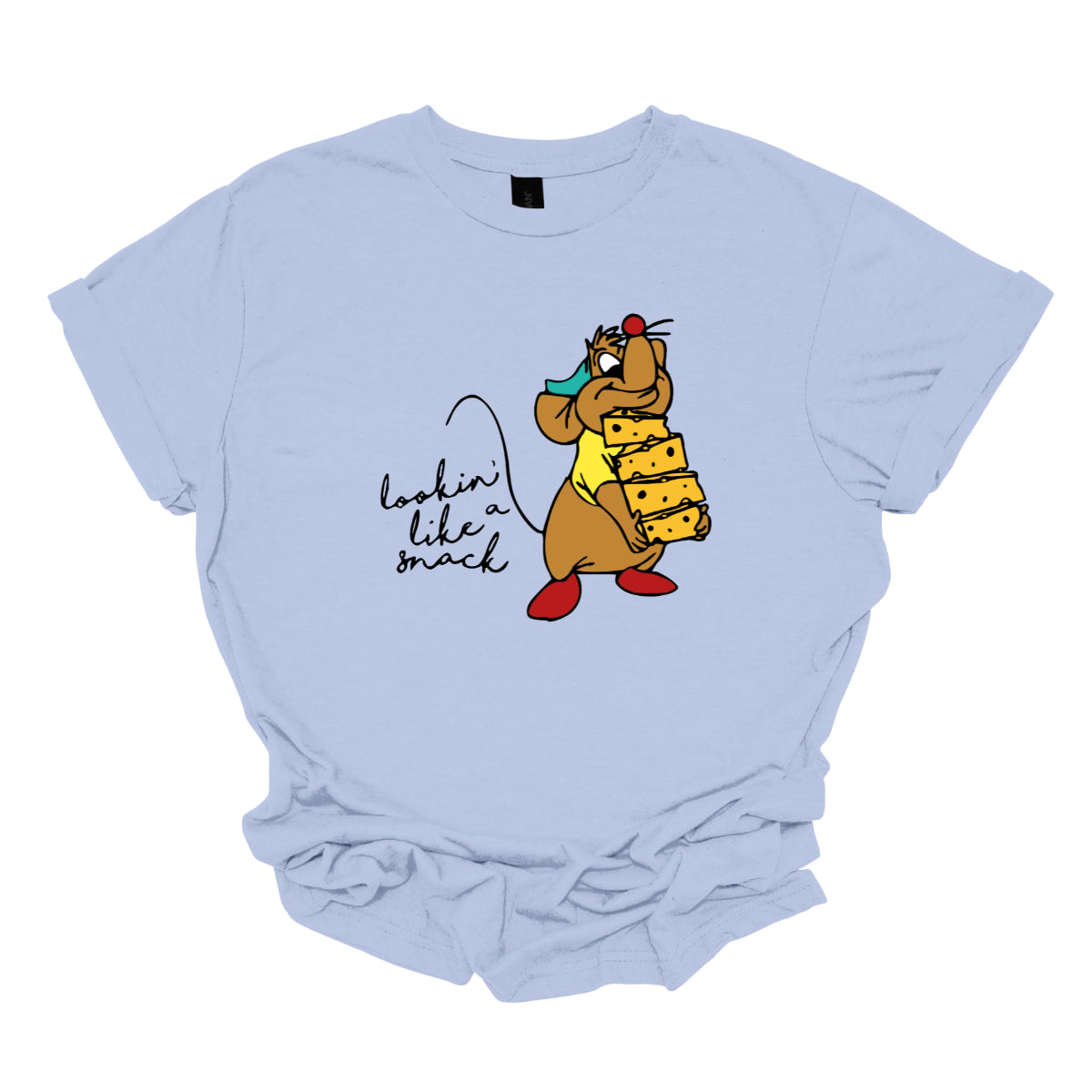 This t-shirt showcases a fun and cheeky design with the playful phrase "Lookin' Like a Snack" written in a delicate black cursive font that adds a touch of elegance. The text is both stylish and sassy, making a light-hearted statement.&nbsp;Adjacent to the text, there's an adorable illustration of the cartoon character Gus Gus from Cinderella. Gus Gus is depicted carrying a blocks of cheese stacked high, balancing it on his chin with a charmingly clumsy look. Shop Gorgeousware.com