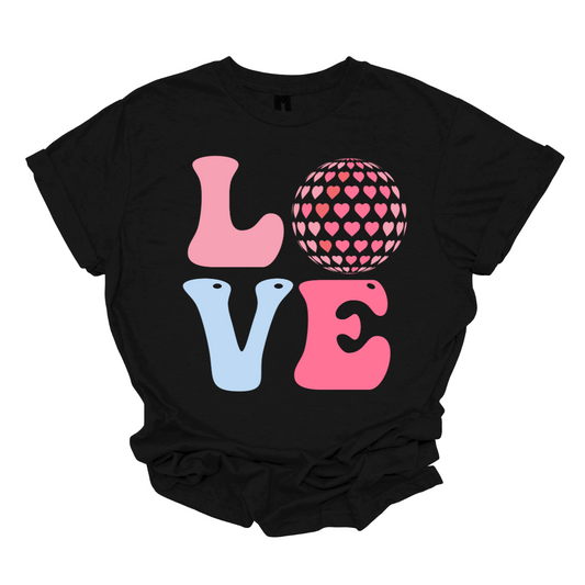 Turn up the love and dance into style with our 'Love' T-shirt featuring a dazzling disco ball in place of the 'O.' This tee is a celebration of love and groovy vibes, fusing romance with a touch of disco glamour. The sparkling disco ball adds a playful and dynamic element to the classic 'Love' message. 