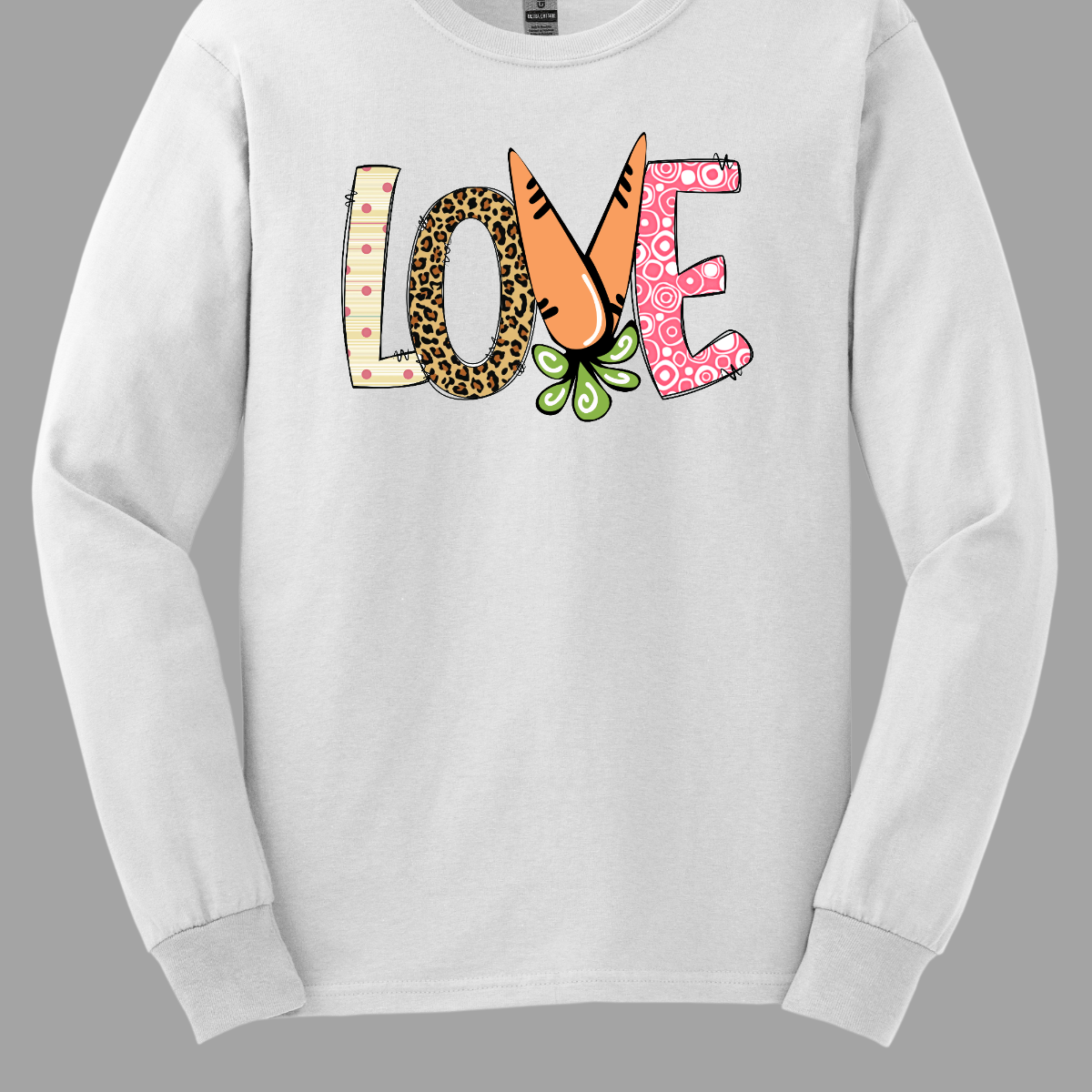 Get ready to celebrate Easter in style with our vibrant 'love' T-shirt! Each letter is adorned with a different spring pattern, capturing the essence of the season's beauty and renewal. But it's the 'V' that steals the show, cleverly crafted as two carrots, symbolizing growth and abundance. This shirt is a playful homage to Easter traditions, blending elements of nature with the warmth of love. Shop at Gorgeousware.com