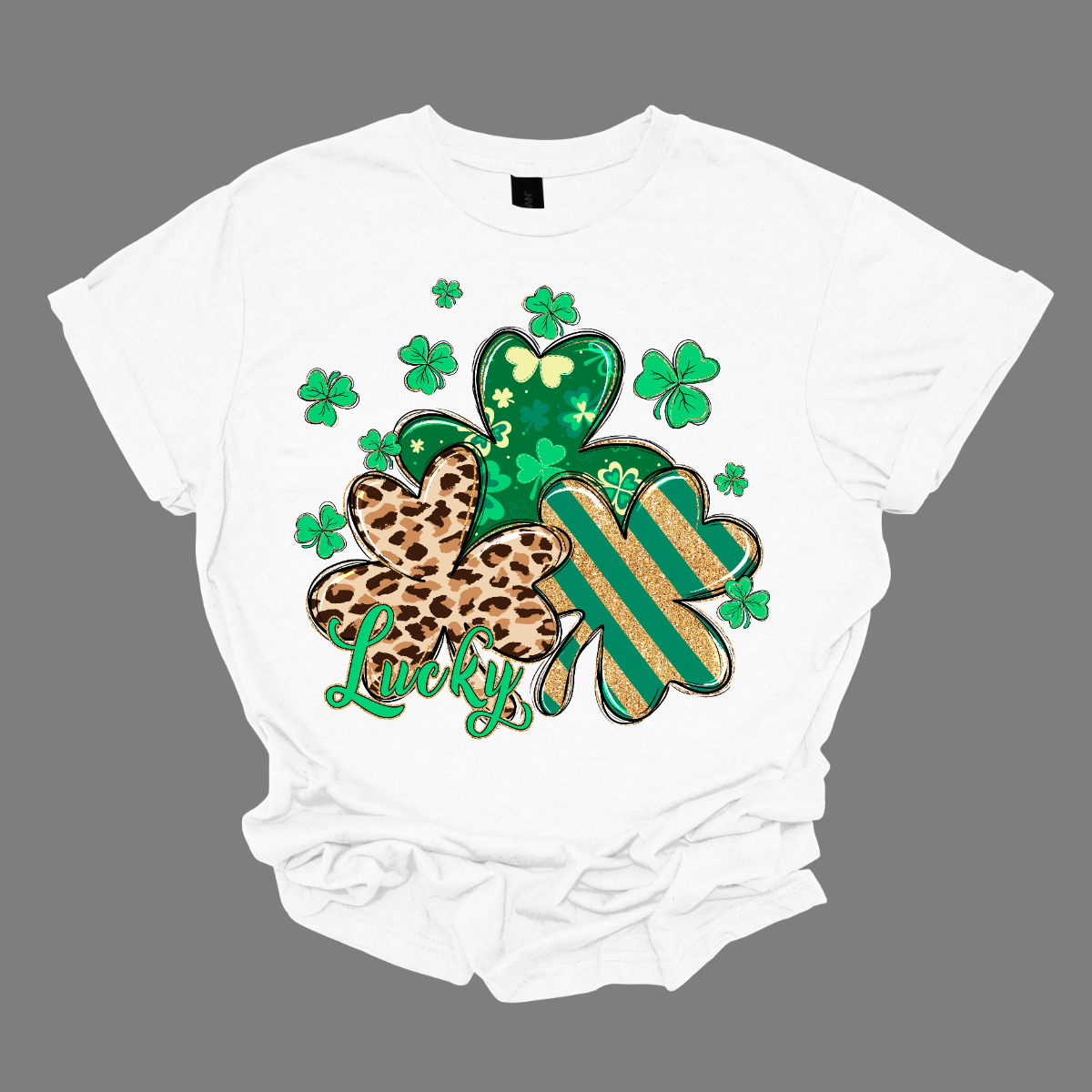 Embrace the luck of the Irish with our spirited St. Patrick's Day shirt featuring a playful twist! Our 'Lucky' shirt boasts a lively pattern of classic shamrocks, including a bold cheetah print shamrock for a touch of wild charm. Shop at Gorgeousware.com