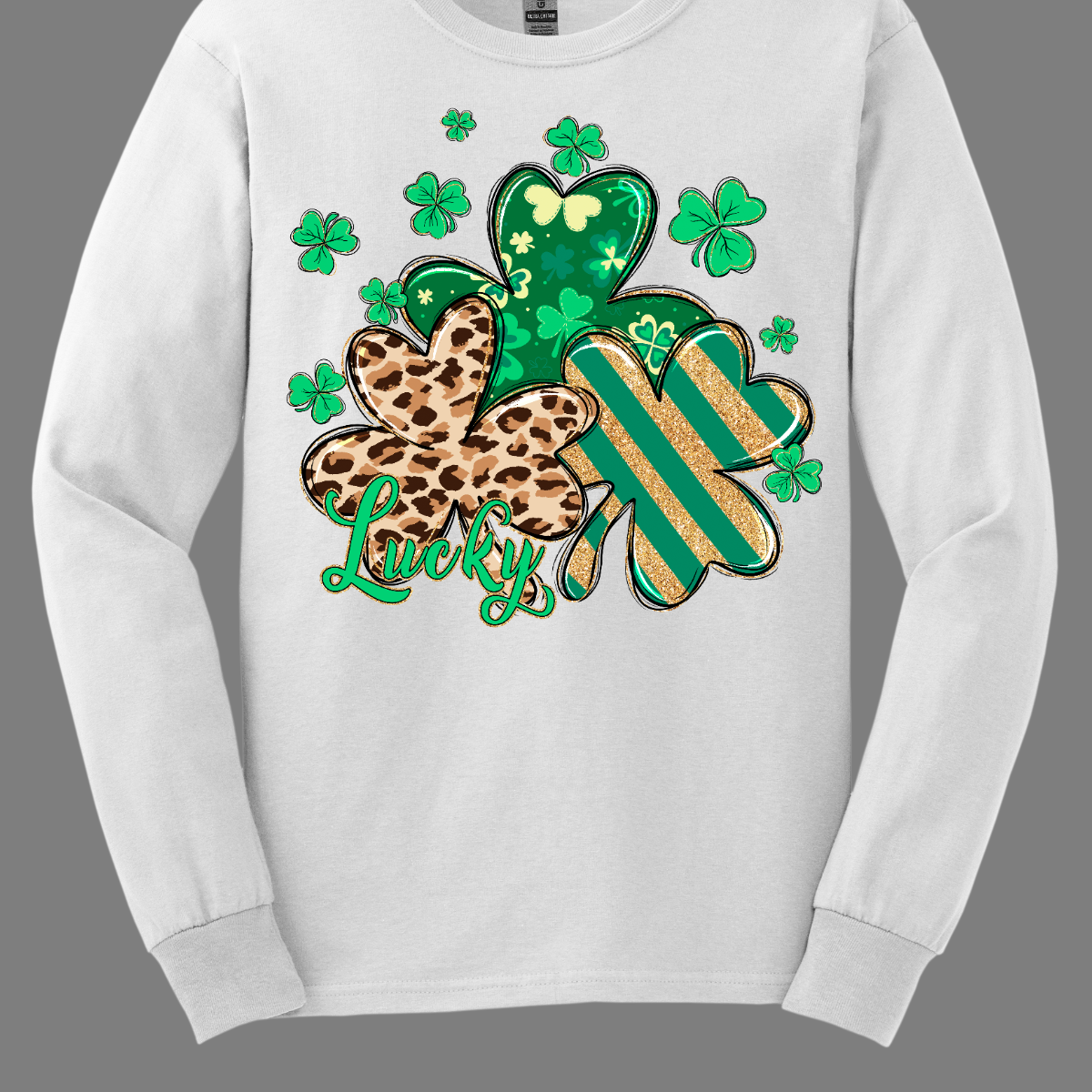 Embrace the luck of the Irish with our spirited St. Patrick's Day shirt featuring a playful twist! Our 'Lucky' shirt boasts a lively pattern of classic shamrocks, including a bold cheetah print shamrock for a touch of wild charm. Shop at Gorgeousware.com