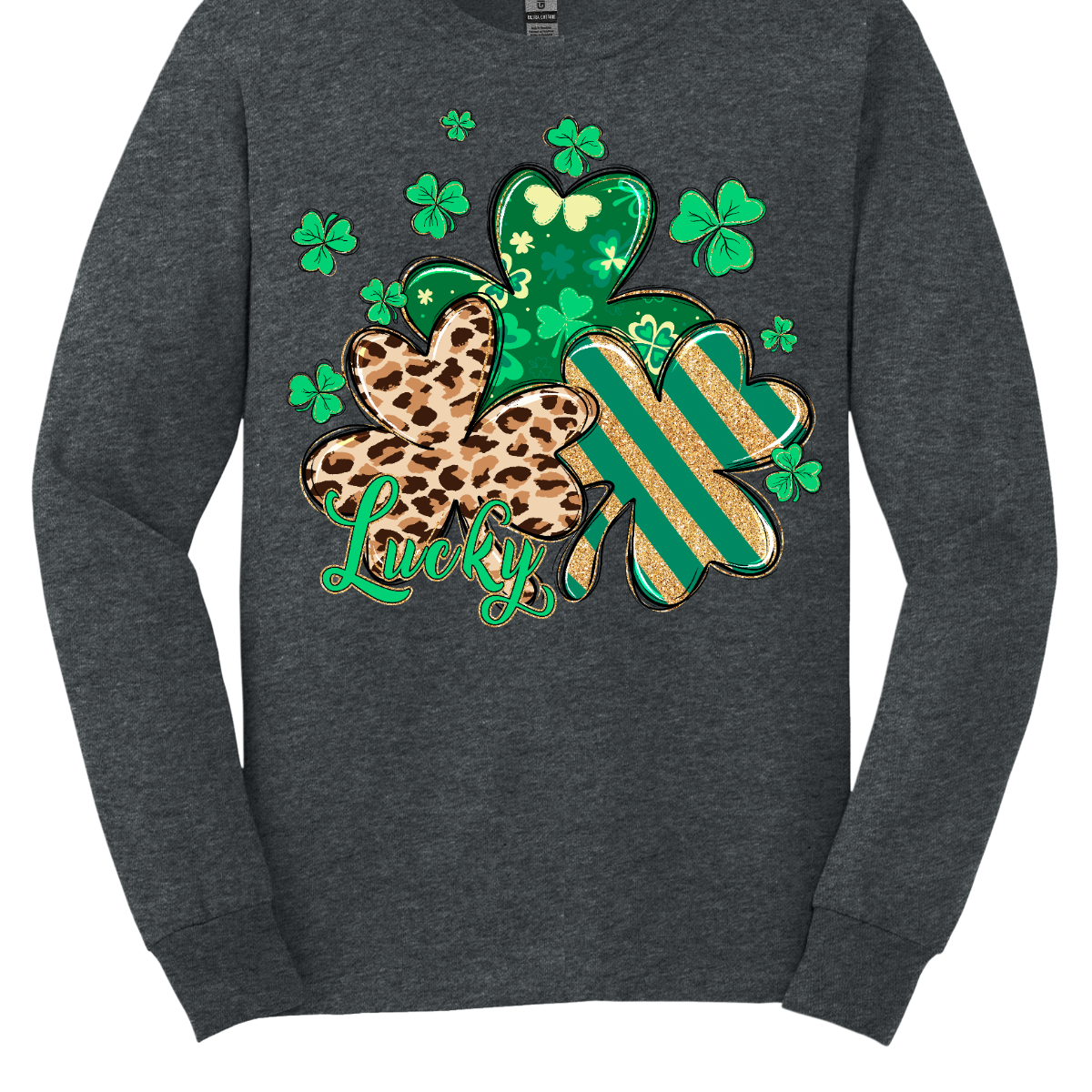 Embrace the luck of the Irish with our spirited St. Patrick's Day shirt featuring a playful twist! Our 'Lucky' shirt boasts a lively pattern of classic shamrocks, including a bold cheetah print shamrock for a touch of wild charm. Shop at Gorgeousware.com