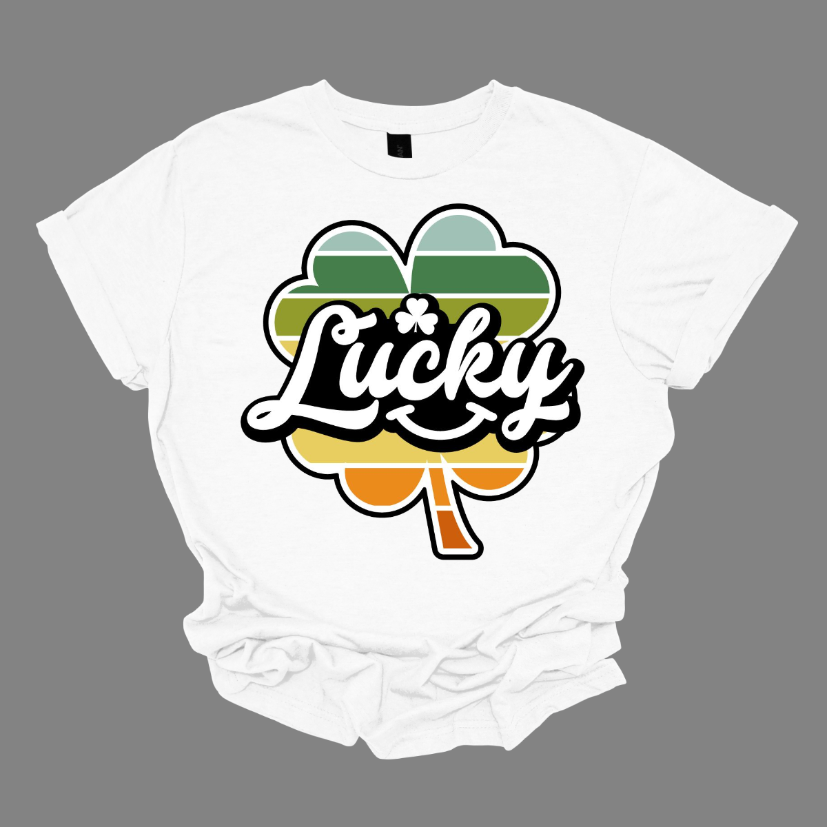  Introducing our "Lucky with Retro Color Striped Shamrock" T-shirt, a vibrant and stylish addition to your wardrobe! This eye-catching design features a bold shamrock in retro-inspired colors, set against the word "lucky" in a playful font. Shop at Gorgeousware.com