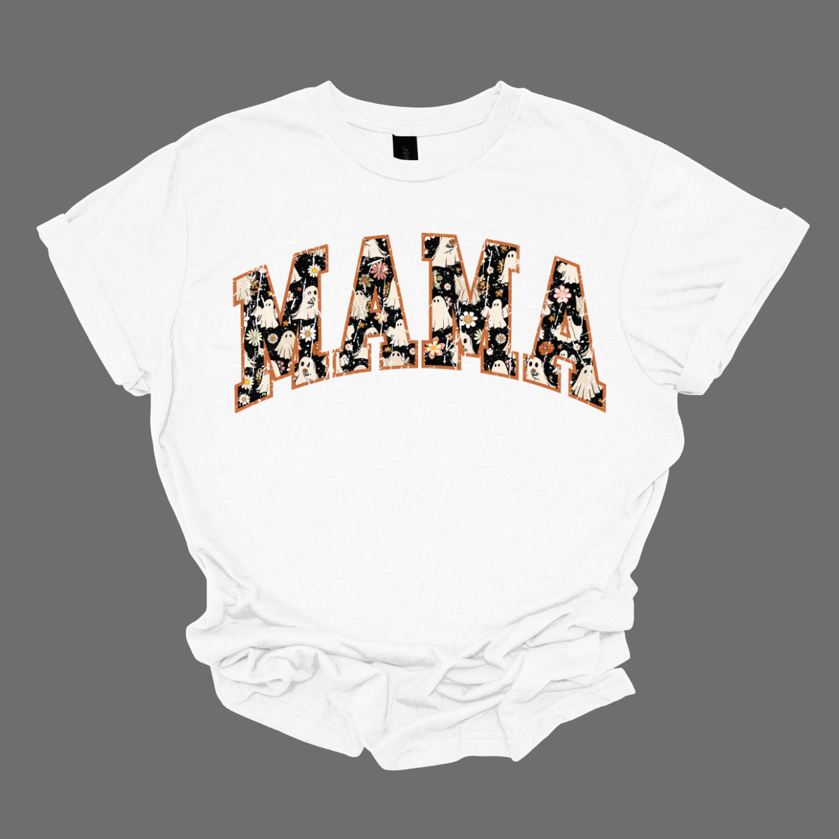 Embrace the season with our Retro 'MAMA' tee, where vintage vibes meet whimsical charm! This shirt features the word 'MAMA' in a playful retro font, adorned with an enchanting pattern of cute ghosts and autumn florals. Each letter is a delightful mix of spooky and sweet, showcasing tiny, friendly ghosts amidst vibrant fall blooms. Crafted from soft, high-quality fabric, this tee is perfect for adding a touch of seasonal spirit to your wardrobe.  Shop at Gorgeousware.com