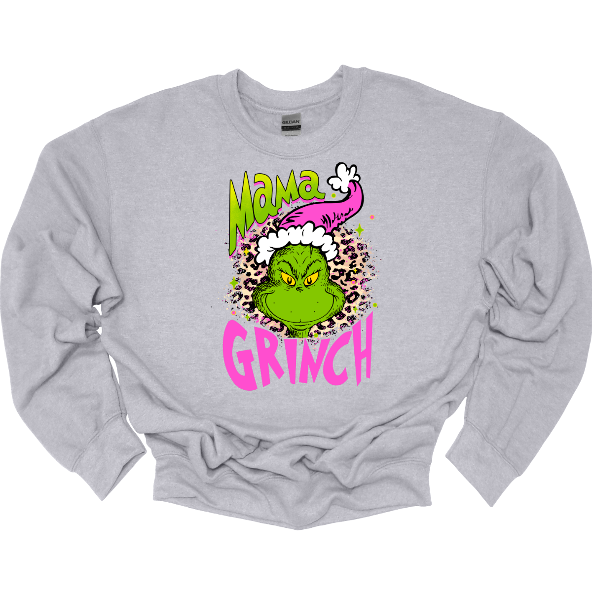 At the center of the design is the phrase "Mama Grinch," rendered in a whimsical, Grinch-style font. The word "Mama" pops in a vibrant green color with a delicate pink shadow that adds a touch of charm. The word "Grinch" contrasts in a bold, eye-catching pink that stands out against the green.&nbsp;Between the two words, there's a delightful illustration of the Grinch himself. He's sporting a cute pink and white Santa hat, which adds a fun and seasonal flair. Shop Gorgeousware.com