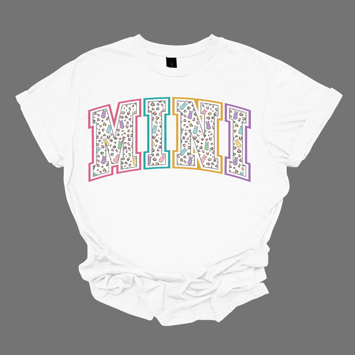 "Mama" and "Mini" Easter T-shirts - Celebrate the bond between mother and child with our charming matching set! Adorned with adorable peeps forming the words "Mama" and "Mini," these Easter-themed shirts are as sweet as can be. Whether you're hunting for eggs, enjoying a springtime picnic, or simply spending quality time together, these shirts are the perfect way to showcase your special connection. Shop at Gorgeousware.com