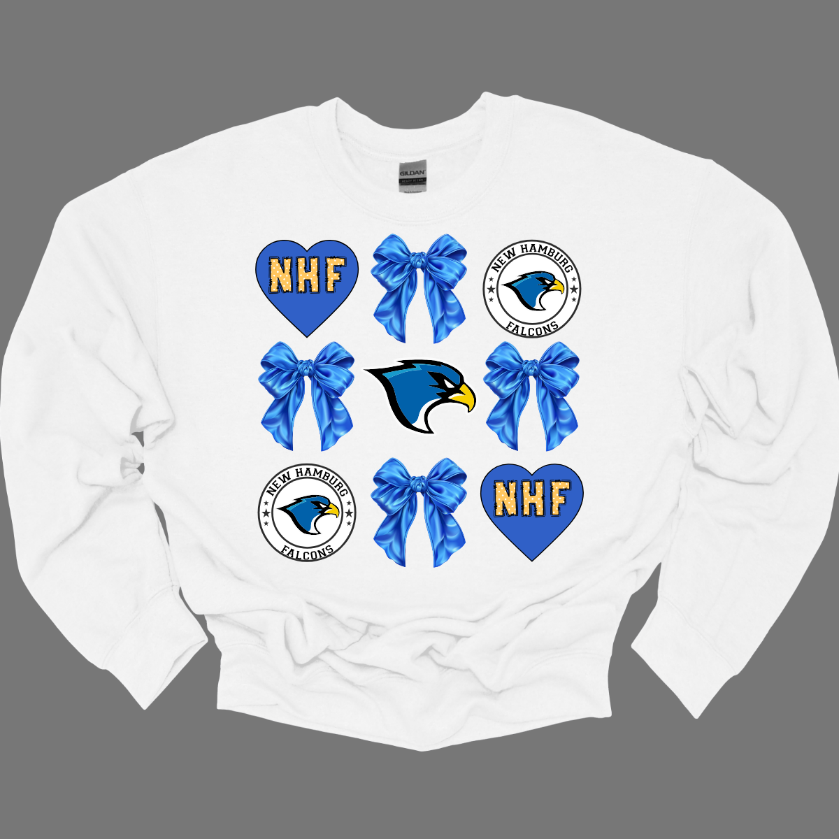 This stylish apparel design for the New Hamburg Falcons Croquet features a blend of classic charm and modern flair. The centerpiece is a bold, fierce falcon head, a dynamic symbol of strength and precision at the core, that perfectly embodies the spirit of the team, surrounded by heart encasing NHF standing for the love of the "New Hamburg Falcons" and a retro-inspired circle log that frames the falcon. Shop at Gorgeousware.com