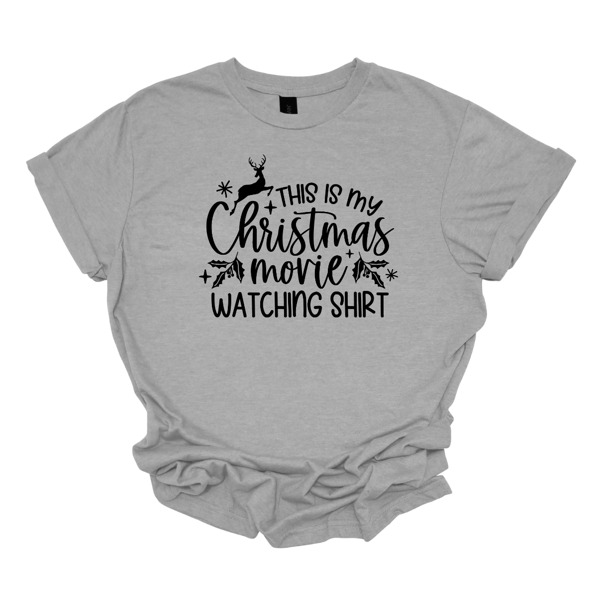 This cozy t-shirt features the playful phrase "This Is My Christmas Movie Watching Shirt" in a straightforward, easy-to-read font. The words "Christmas Movie" are beautifully highlighted in an elegant cursive font, adding a touch of festive flair. Shop Gorgeousware.com