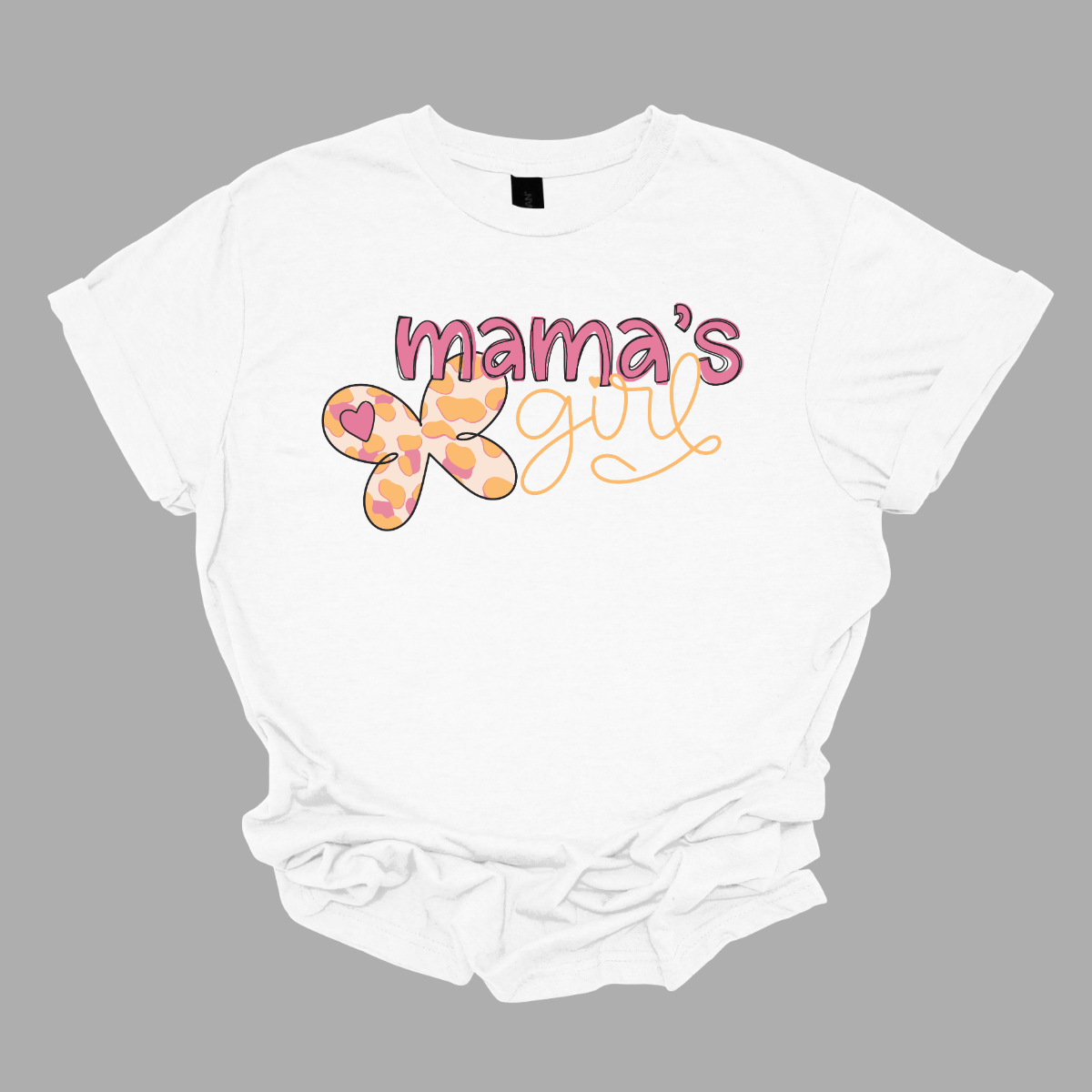 Express the special bond between mother and daughter with our 'Mama's Girl' T-shirt adorned with a graceful butterfly. This tee captures the essence of love and transformation, just like the metamorphosis of a butterfly. The delicate and beautiful butterfly design adds a touch of whimsy and elegance to the heartfelt message.