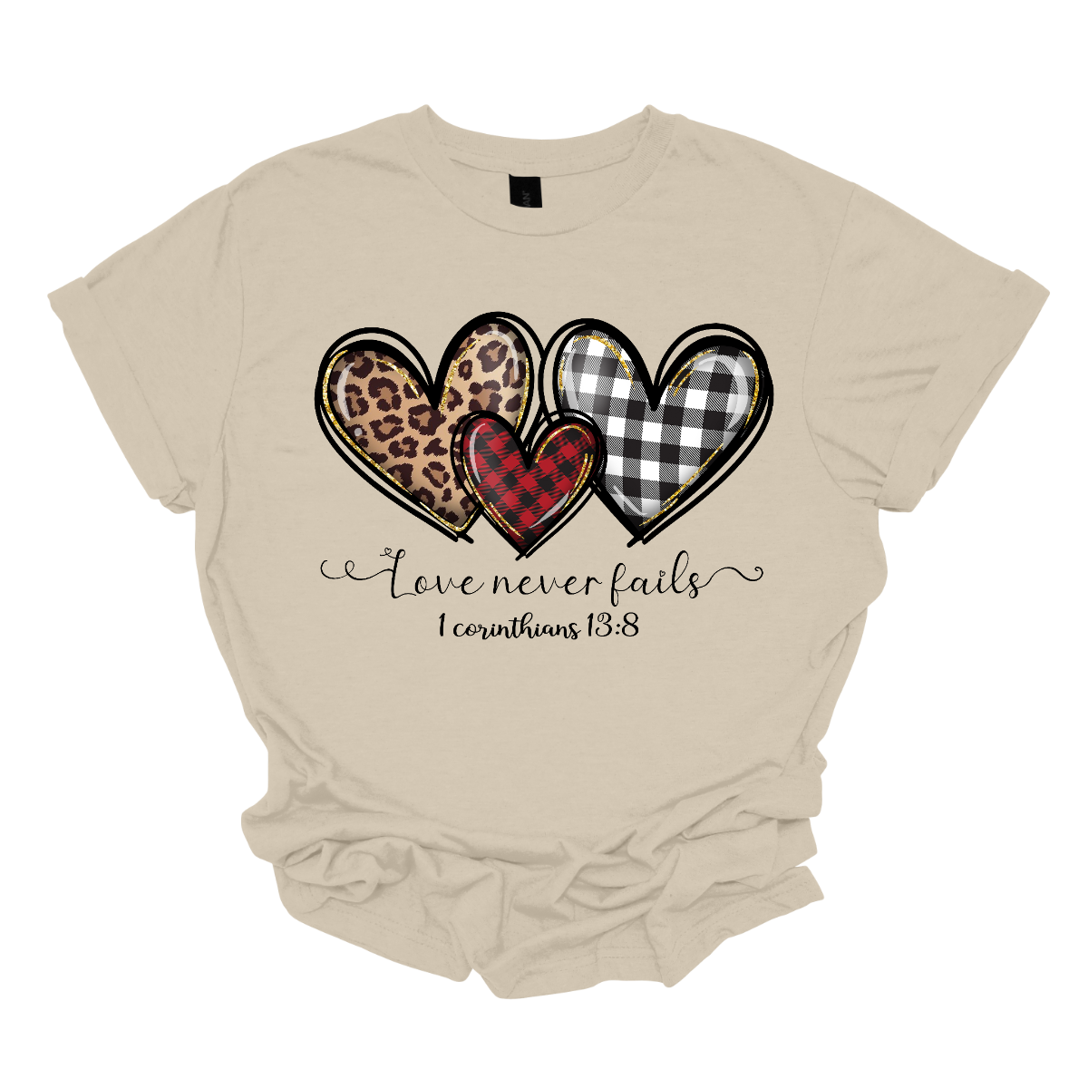 Introducing our "Love Never Fails - 1 Corinthians 13:8" T-shirt – a profound and heartwarming garment adorned with three adorable patterned hearts. This shirt carries a timeless message inspired by the scripture, emphasizing the enduring nature of love. The phrase "Love Never Fails - 1 Corinthians 13:8" is elegantly displayed, drawing inspiration from the Bible verse. Surrounding the sentiment are three cute hearts, each uniquely patterned with delightful designs. Shop at Gorgeousware.com