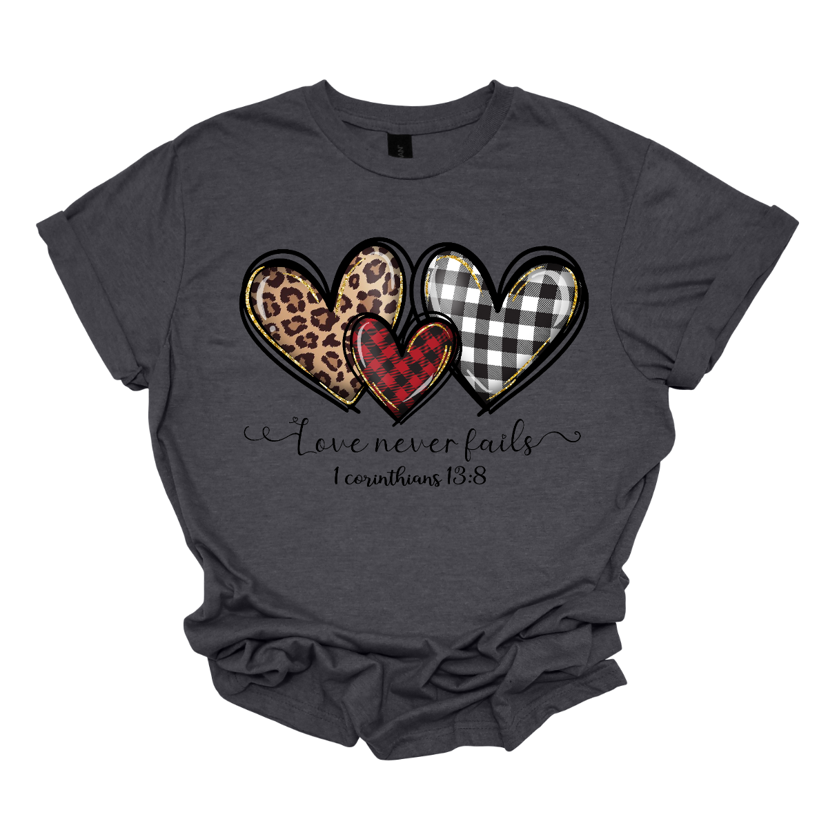 Introducing our "Love Never Fails - 1 Corinthians 13:8" T-shirt – a profound and heartwarming garment adorned with three adorable patterned hearts. This shirt carries a timeless message inspired by the scripture, emphasizing the enduring nature of love. The phrase "Love Never Fails - 1 Corinthians 13:8" is elegantly displayed, drawing inspiration from the Bible verse. Surrounding the sentiment are three cute hearts, each uniquely patterned with delightful designs. Shop at Gorgeousware.com