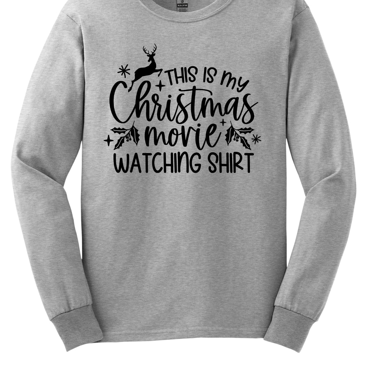 This cozy t-shirt features the playful phrase "This Is My Christmas Movie Watching Shirt" in a straightforward, easy-to-read font. The words "Christmas Movie" are beautifully highlighted in an elegant cursive font, adding a touch of festive flair. Shop Gorgeousware.com