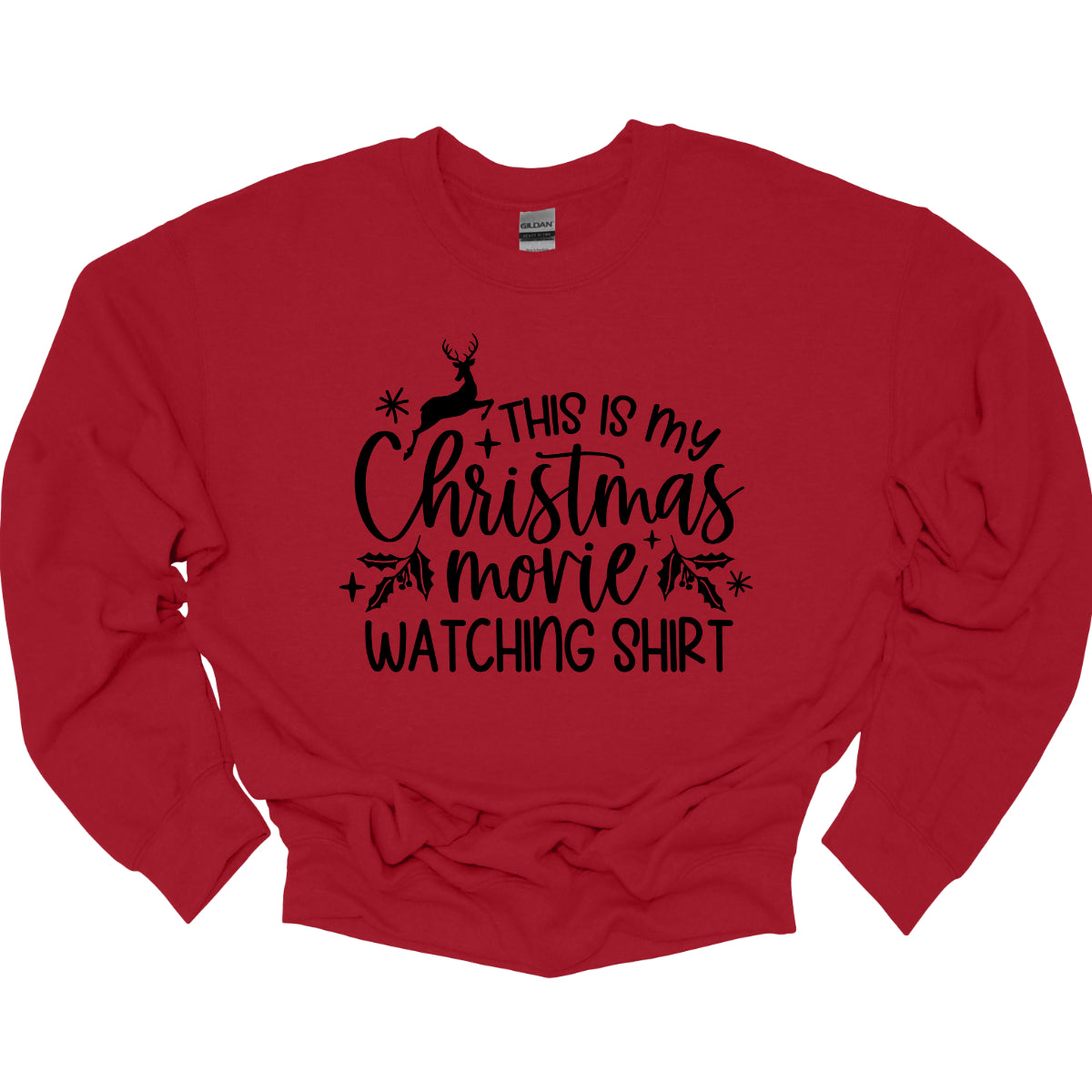 This cozy t-shirt features the playful phrase "This Is My Christmas Movie Watching Shirt" in a straightforward, easy-to-read font. The words "Christmas Movie" are beautifully highlighted in an elegant cursive font, adding a touch of festive flair. Shop Gorgeousware.com