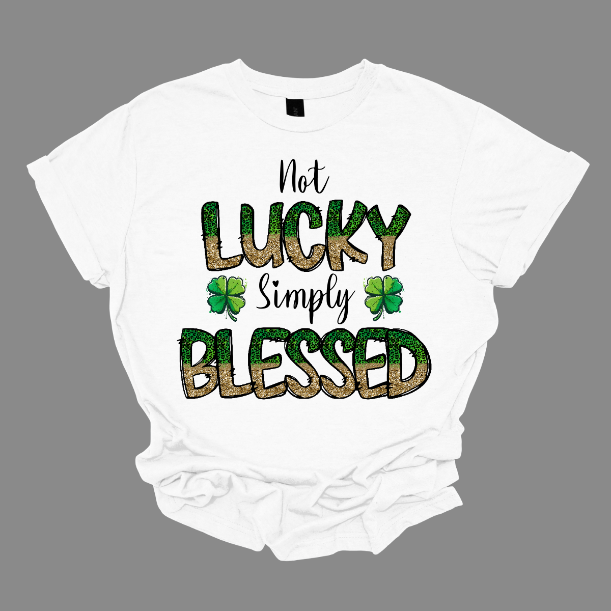 Introducing our "Not Lucky, Simply Blessed" T-shirt, a heartfelt expression of gratitude and positivity! This inspiring design features bold green and gold letters that stand out against a solid background, making a stylish statement wherever you go. Wear it with jeans for a casual look, or dress it up with a skirt for a more polished ensemble. However you choose to style it, this T-shirt is sure to make a statement and inspire those around you. Shop at Gorgeousware.com