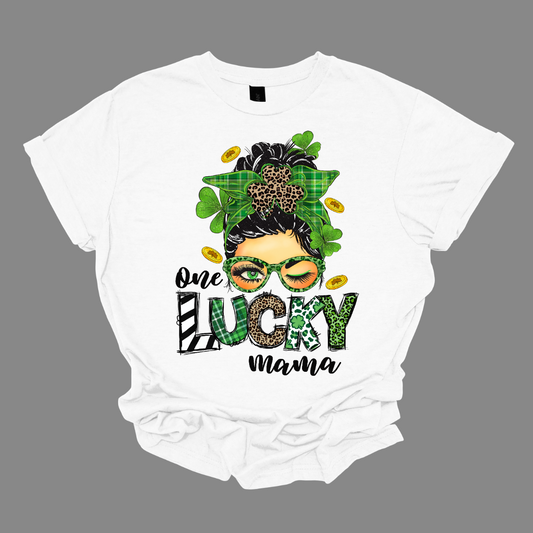  Embrace your mom pride with our charming "One Lucky Mama" T-shirt! This adorable design features a whimsical illustration of a mom sporting a messy updo and trendy green glasses, exuding a fun and carefree vibe. Celebrate the joy of motherhood in style with our "One Lucky Mama" T-shirt. It's a must-have addition to your wardrobe and also makes a thoughtful gift for any proud mama in your life. Wear it with pride and let the world know just how lucky you feel to be a mom! Shop at Gorgeousware.com