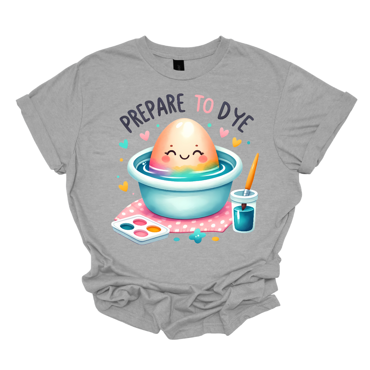 Get ready to add a splash of color to your Easter celebrations with our 'Prepare to Dye' T-shirt! This playful design features an Easter egg sitting in a bowl of dye alongside a paintbrush, capturing the excitement of decorating eggs for the holiday. Shop at Gorgeousware.com